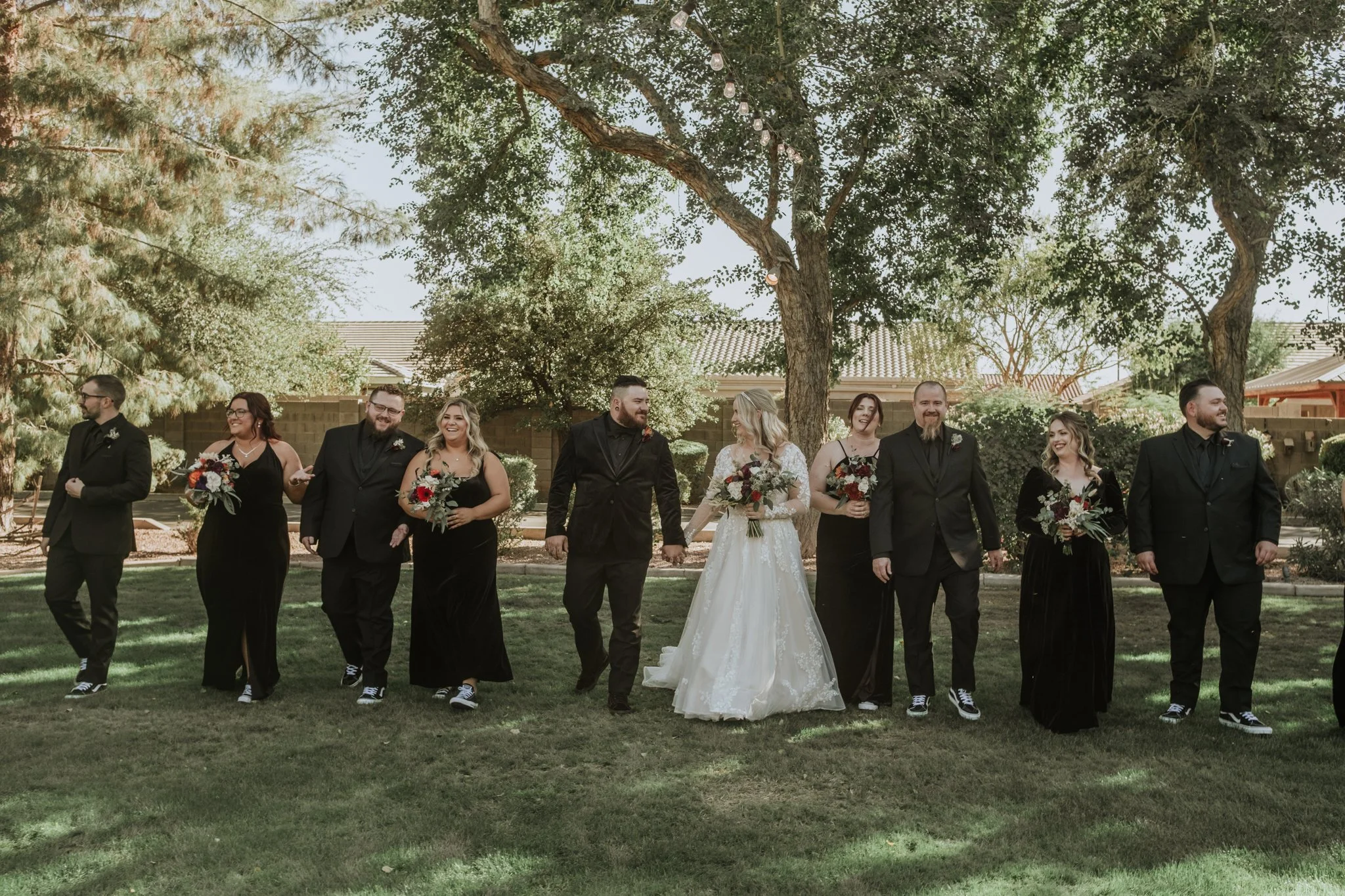 Full wedding party portrait for a dark and moody fall wedding