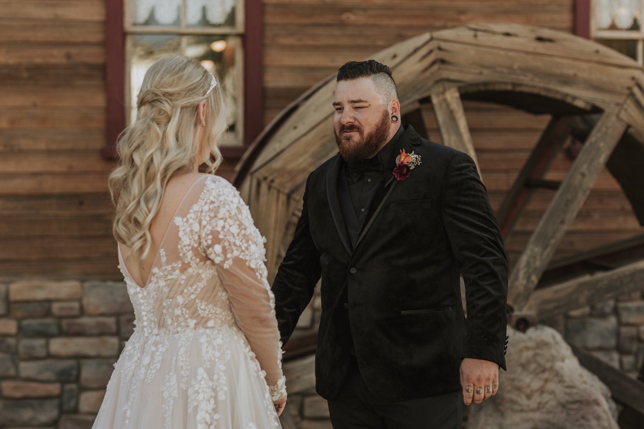 Bride and groom share a private first look, planned by their full service wedding planner