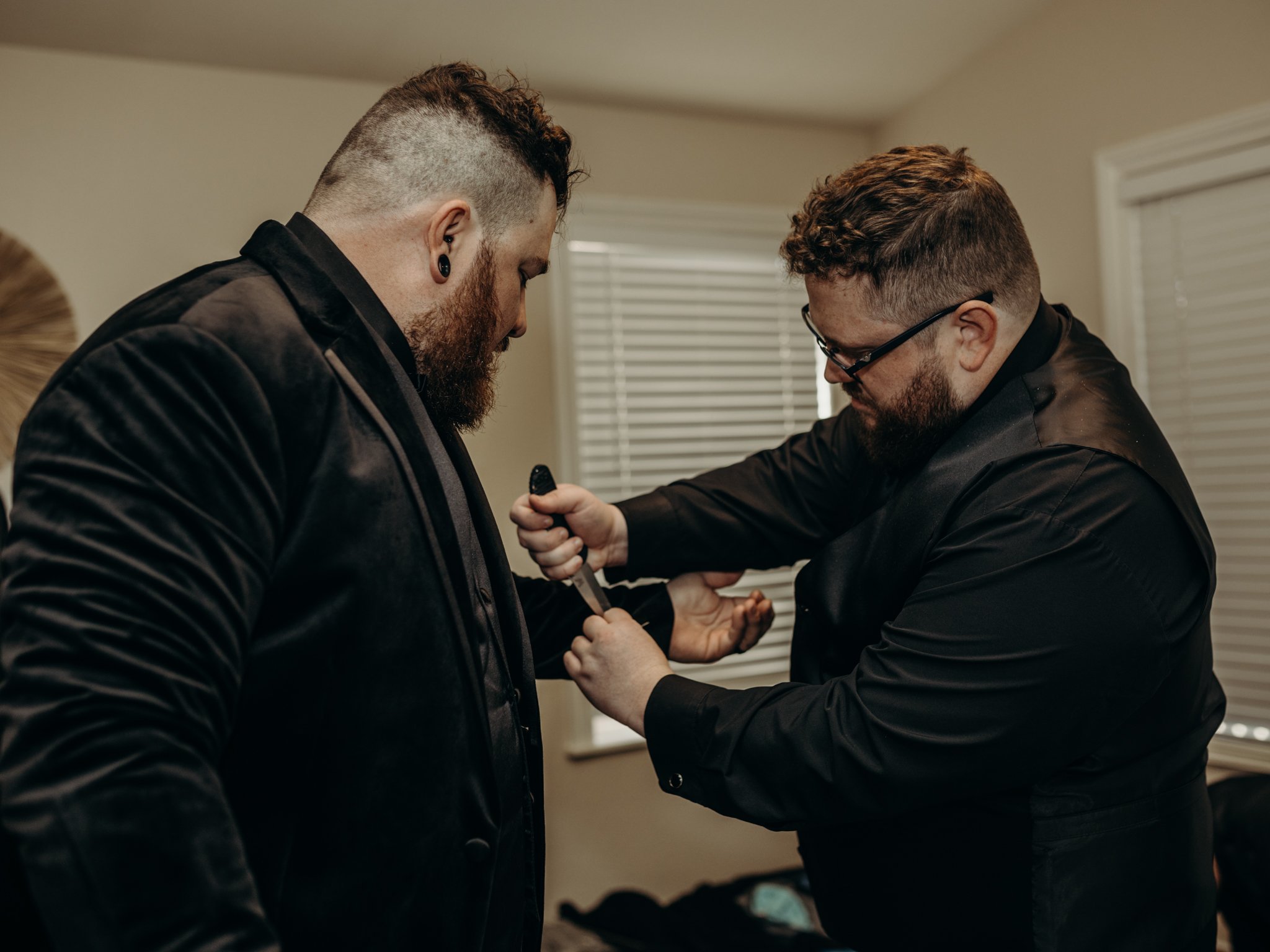 Groom finishing his look at Shenandoah Mill before the first look