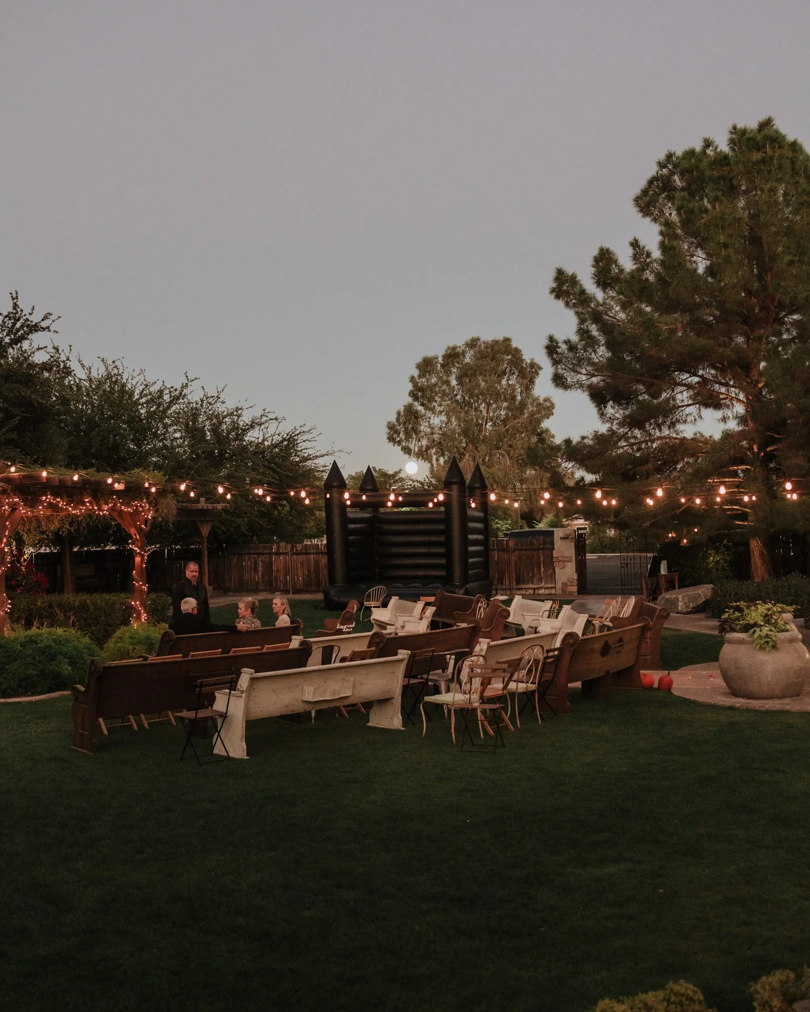 Guests mingle at cocktail hour during a Gilbert, Arizona wedding