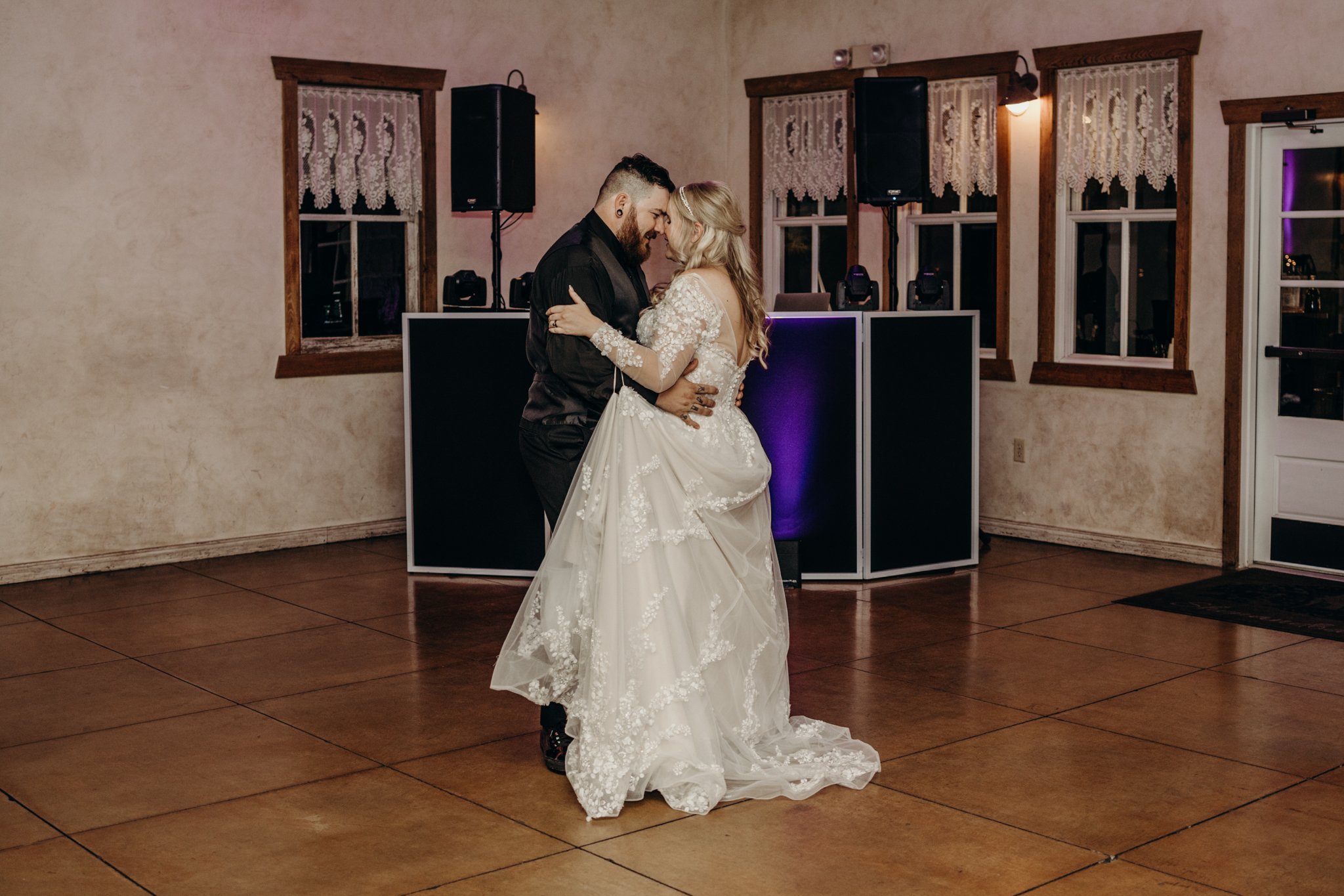 First dance under moody purple lighting at a Shenandoah Mill reception
