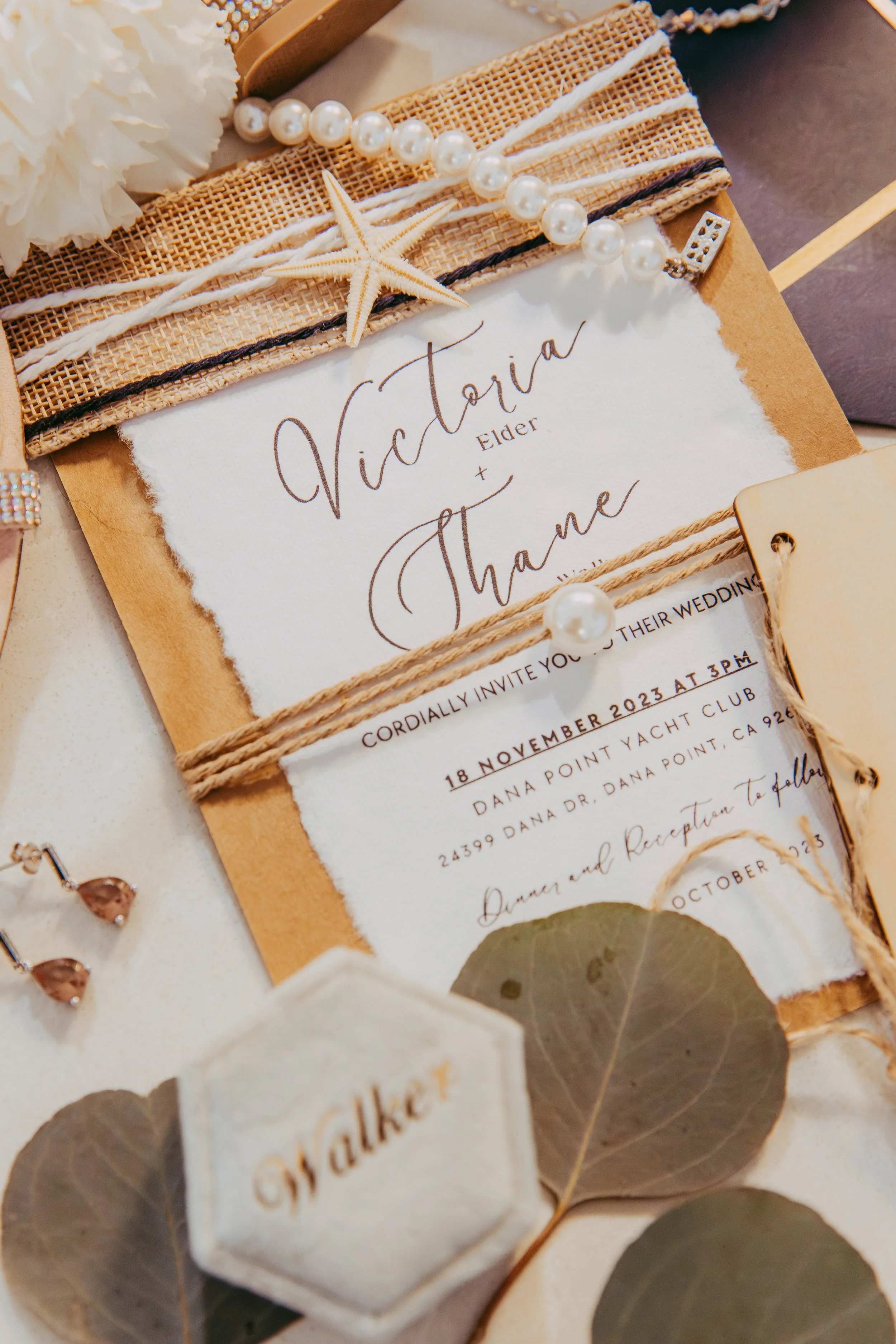 Coastal wedding invitation suite for a Dana Point Yacht Club wedding with starfish and pearls