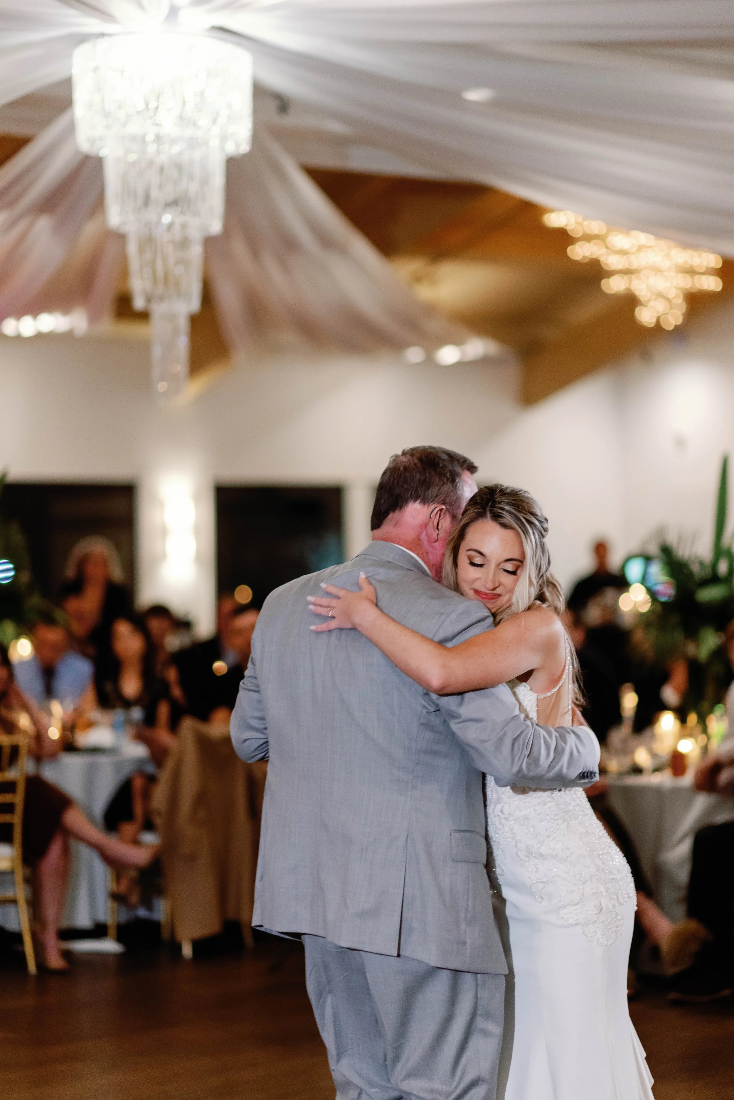 Bride shares a father-daughter dance at her Dana Point Yacht Club reception