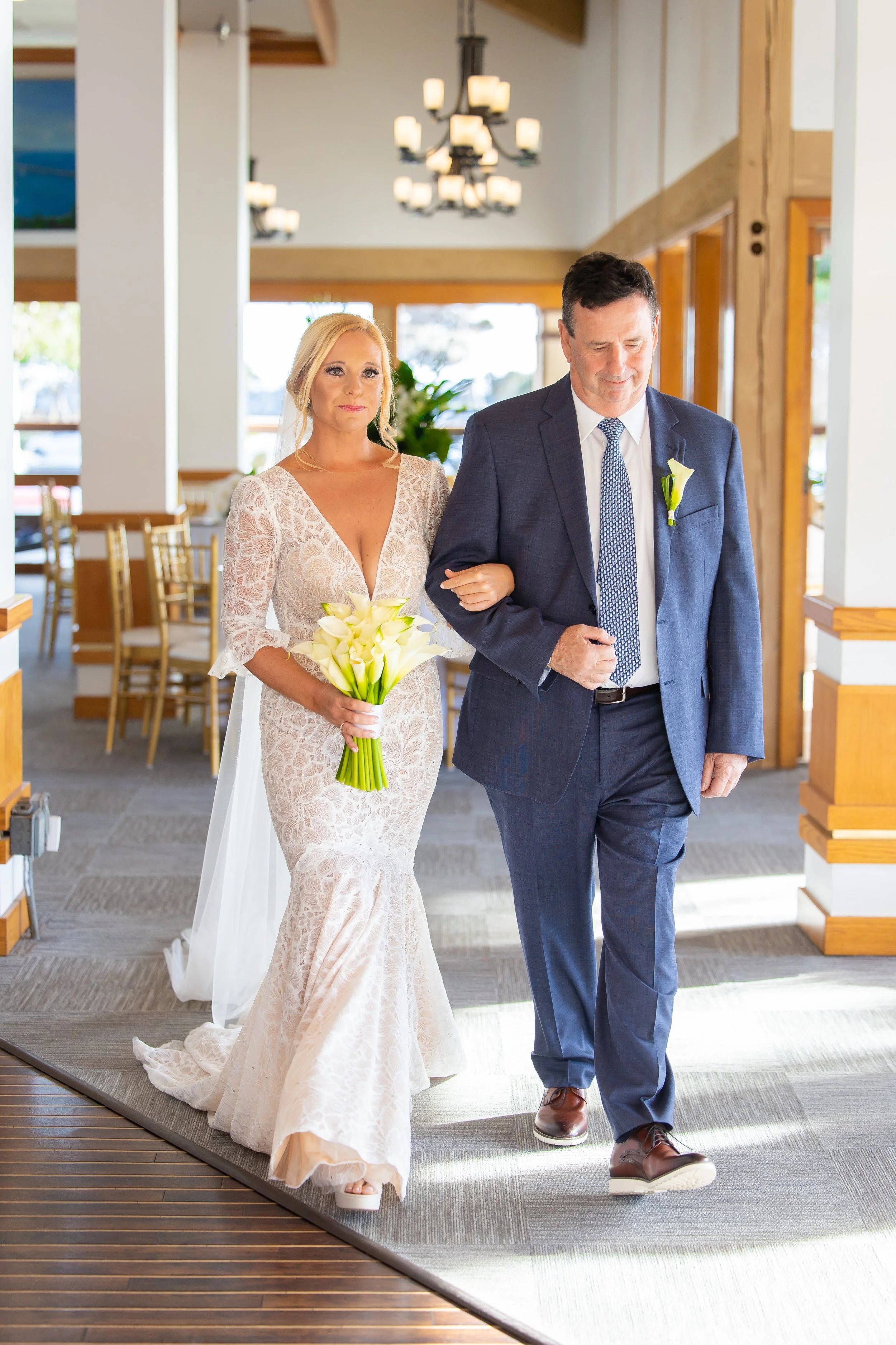Bride enters with her father at a Dana Point Yacht Club wedding