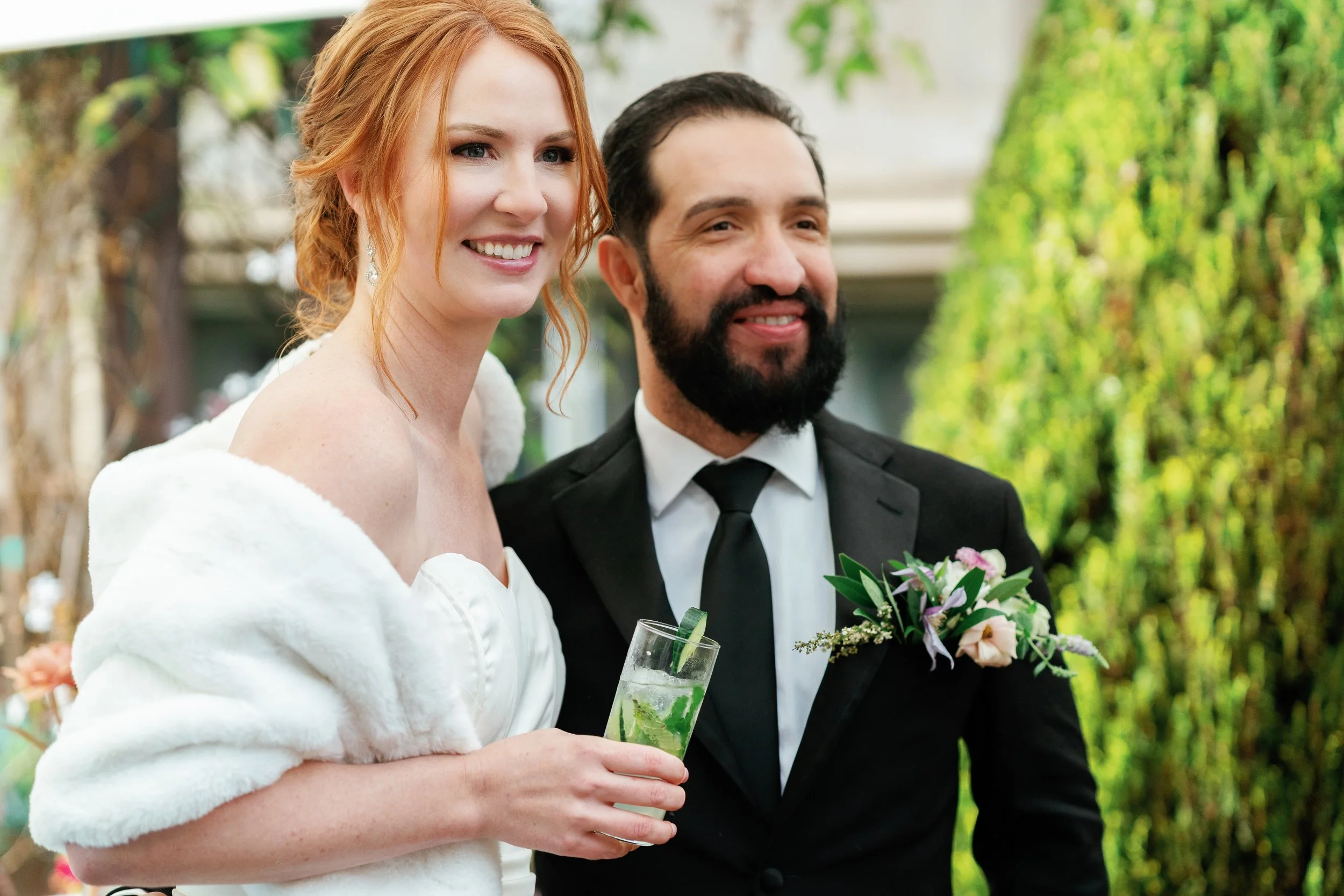 Newlyweds enjoying a toasts together during reception