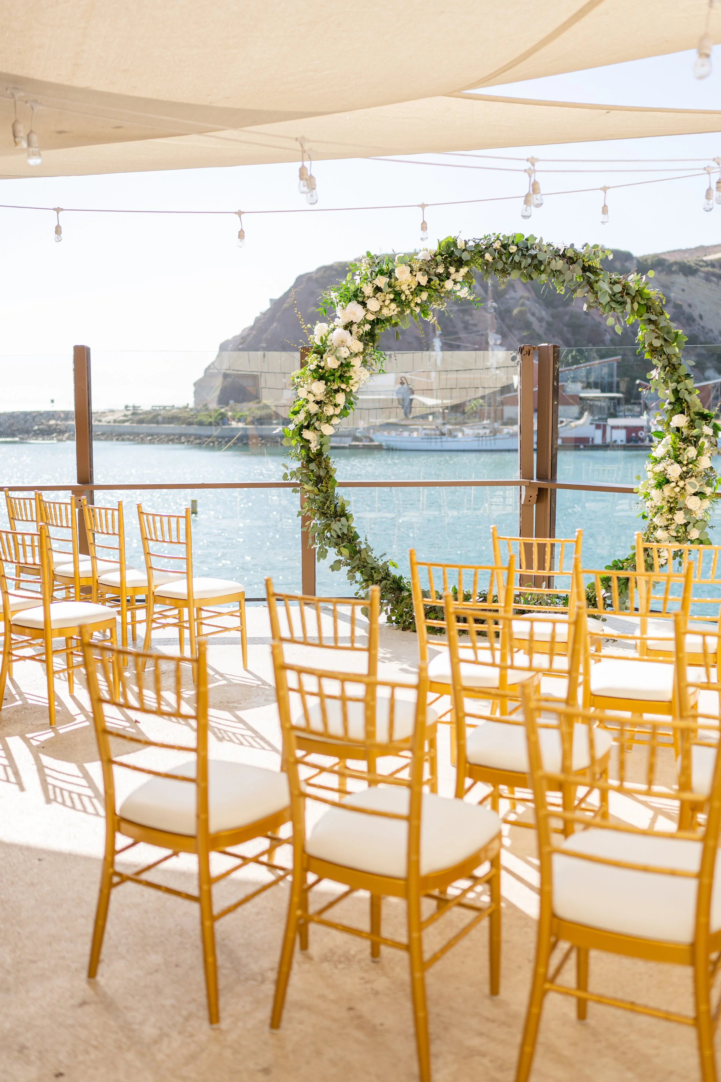 orange county wedding venue dana point yacht club ceremony set up 