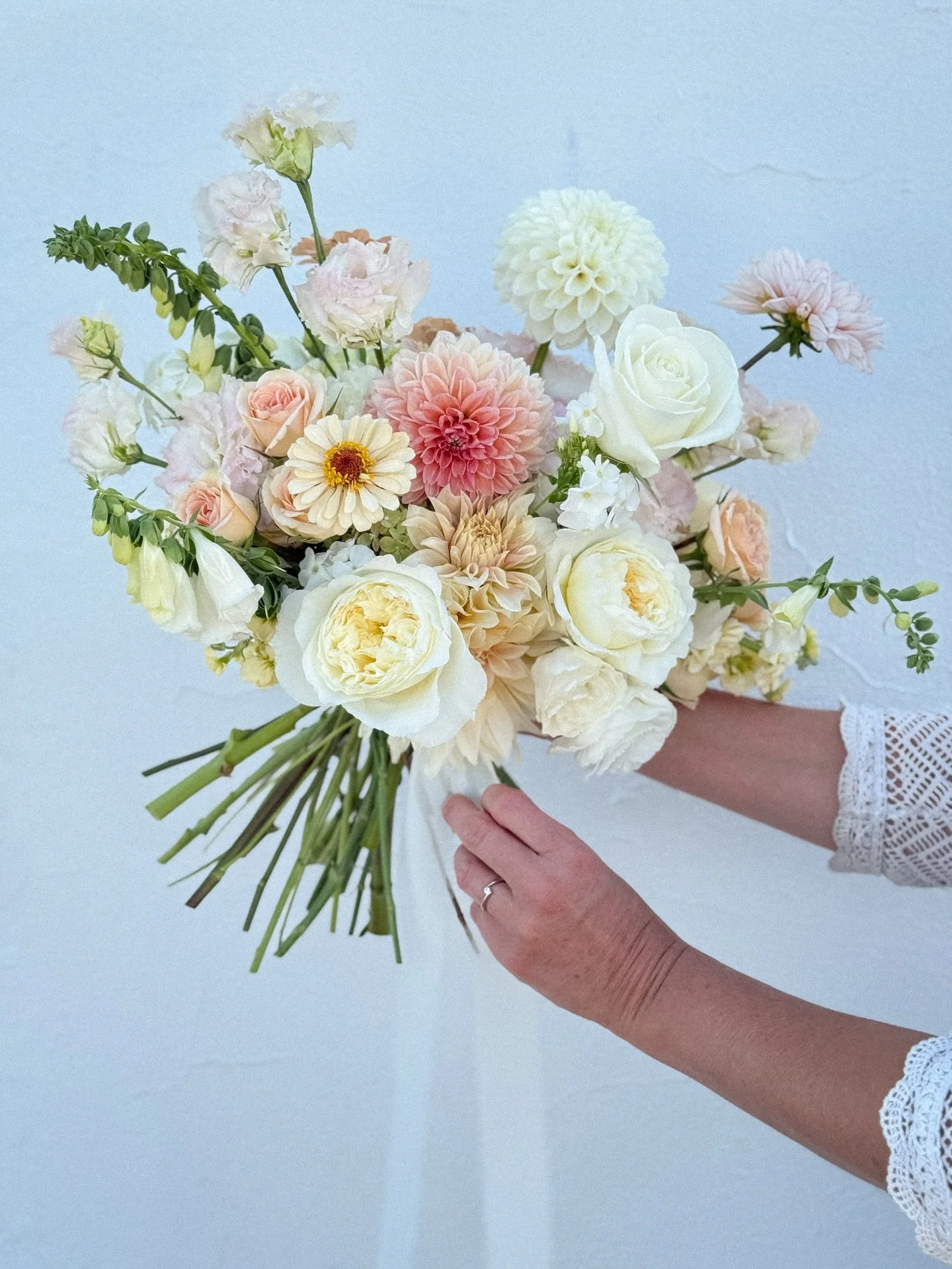 Late summer is all about dahlias, zinnias, and lisianthus &mdash; delicate, textural blooms at their peak. Gathered in a loose, garden style bouquet for a soft and timeless bridal look.

#foragesistersfloraldesign #quincywa #washingtonflorist #washin