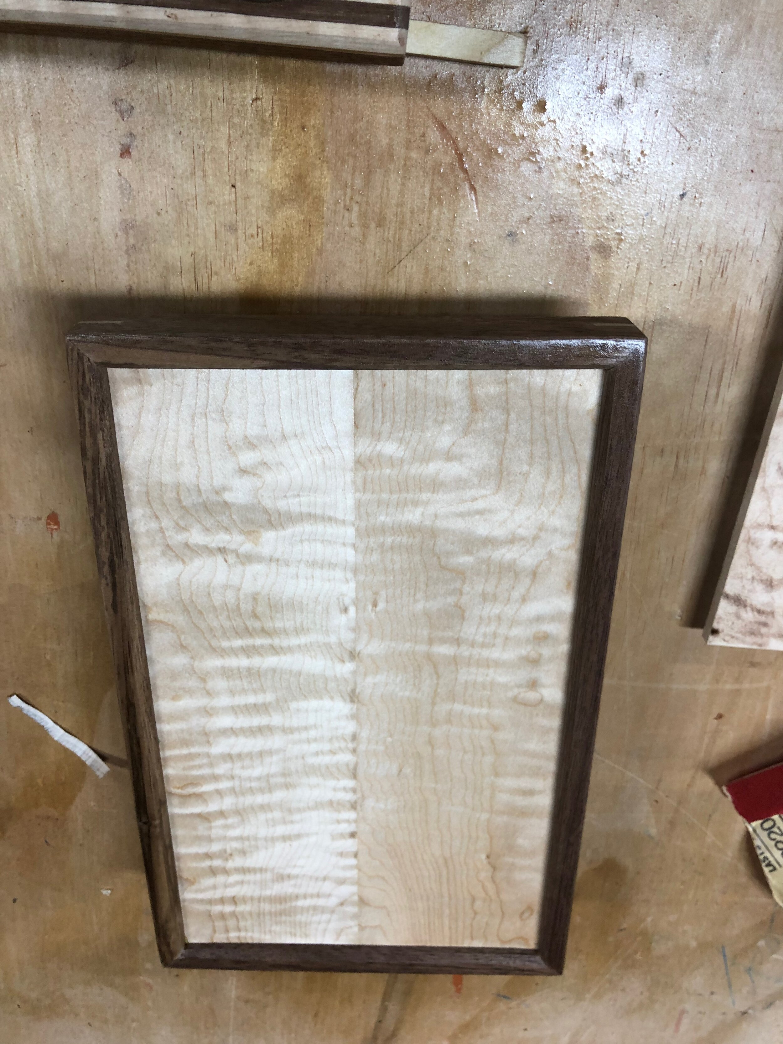 The book match maple with walnut trim, lid for another bourbon box. 
