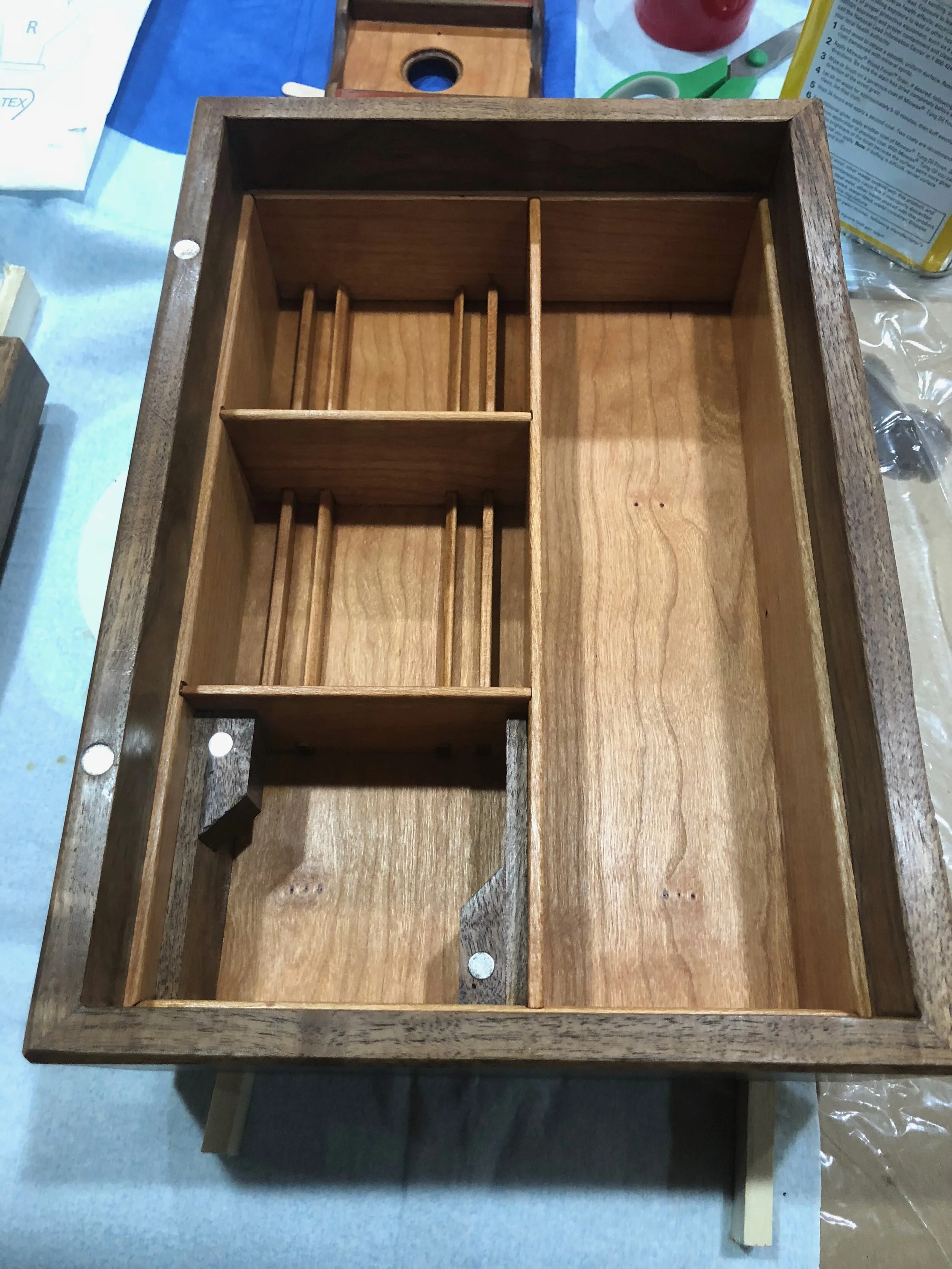 A whiskey box that I made for a friend. Walnut and maple. 