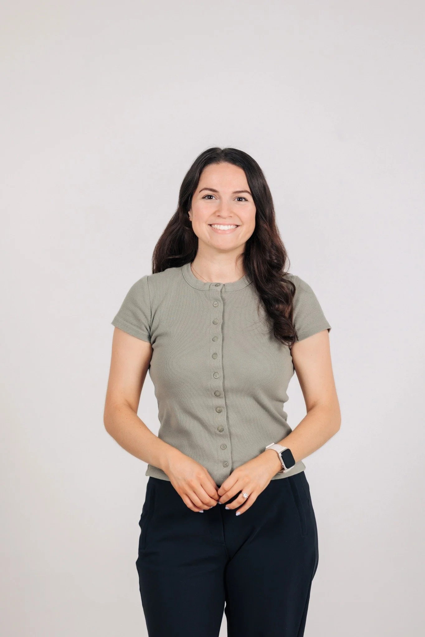 Headshot on grey background of Sarah Kelliher APR - 2026 2027 FPRA Orlando President.png