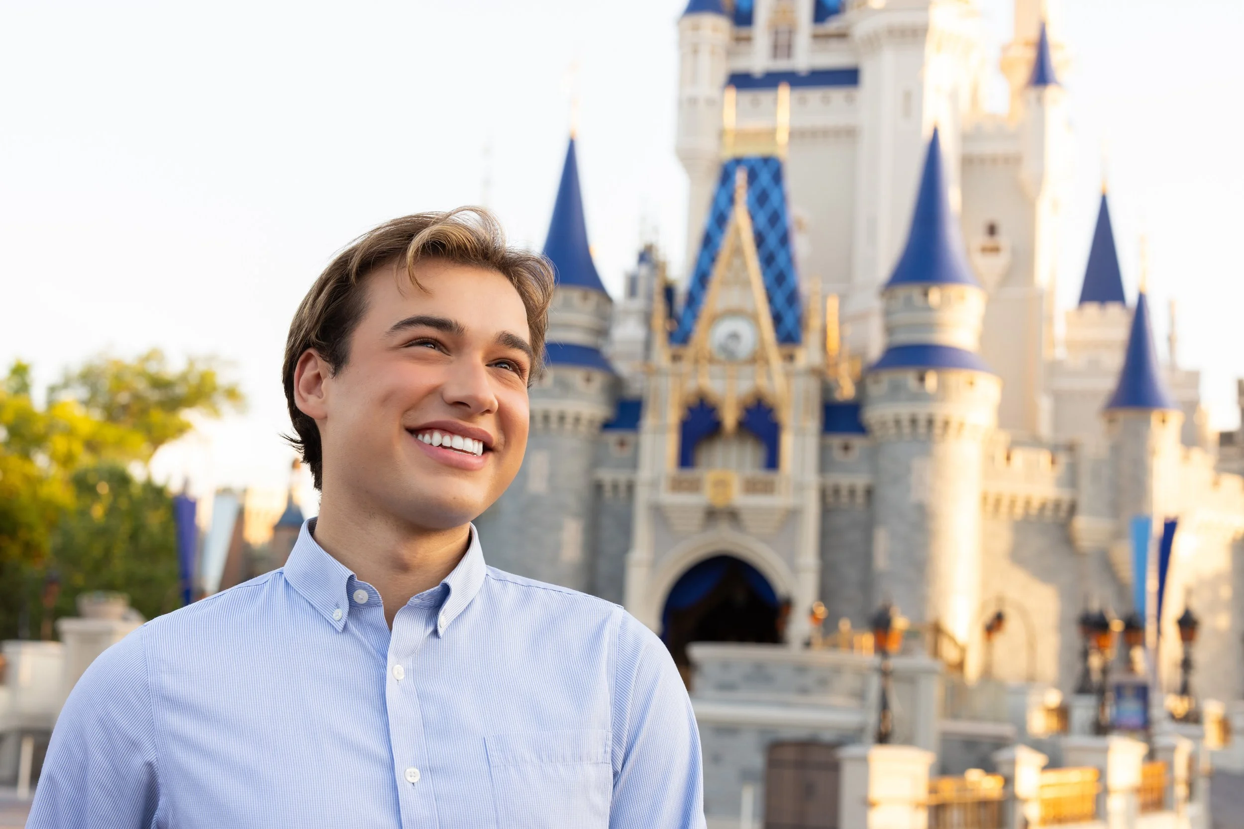 Headshot of FPRA Orlando 2026-2027 Secretary Andy Ayup in front of Disney castle