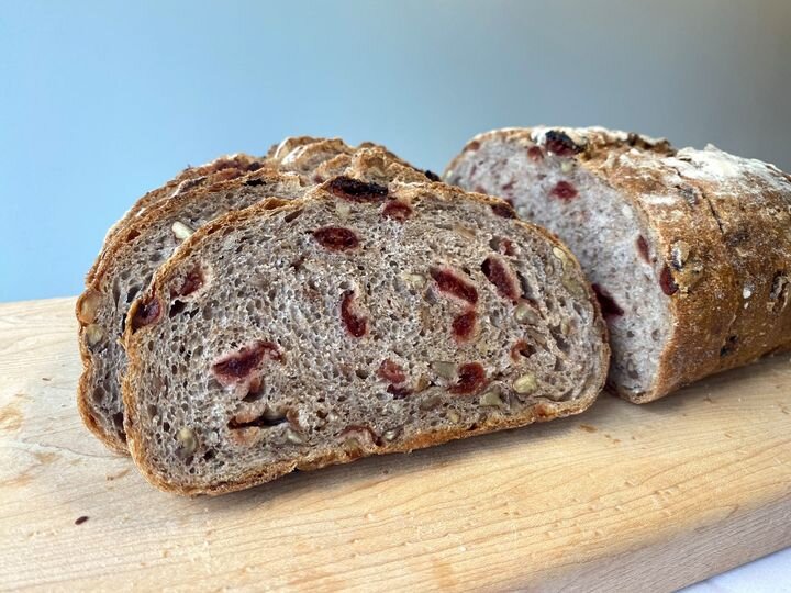 The Cranberry Pecan Country bread is a rustic loaf made from a mixture of rye, whole wheat, and white flour and is chock full of chopped pecans and cranberries.  It's great for toast, sandwiches, crostini, and table bread.

We enjoy snacking on a toa