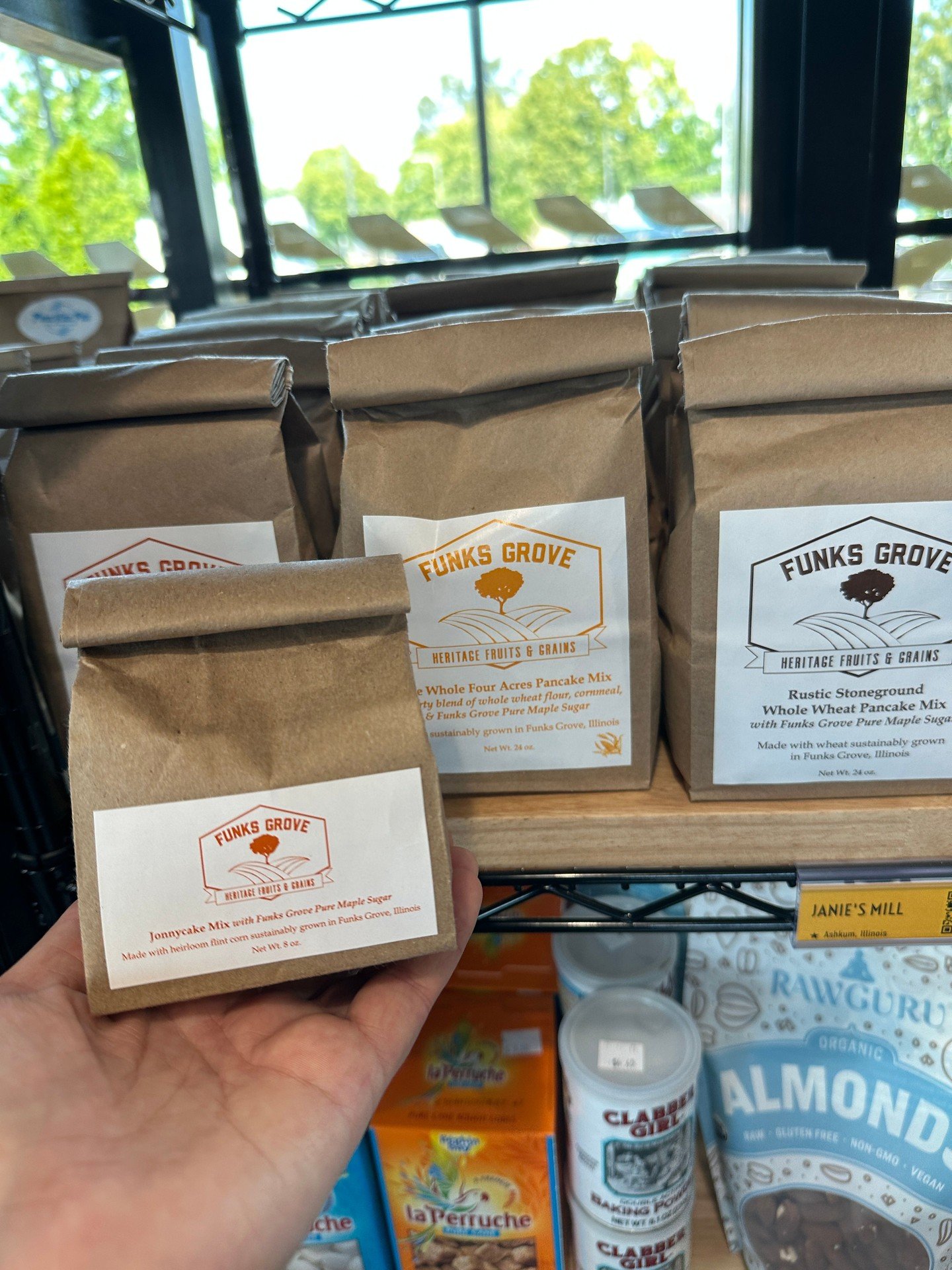 We want to shine a light on one of our favorite Illinois producers: Funk's Grove Heritage Fruits &amp; Grains.
Located in McLean, IL, Funk's Grove has been growing heritage grains and milling flour for generations. We carry their mixes at Martinelli'