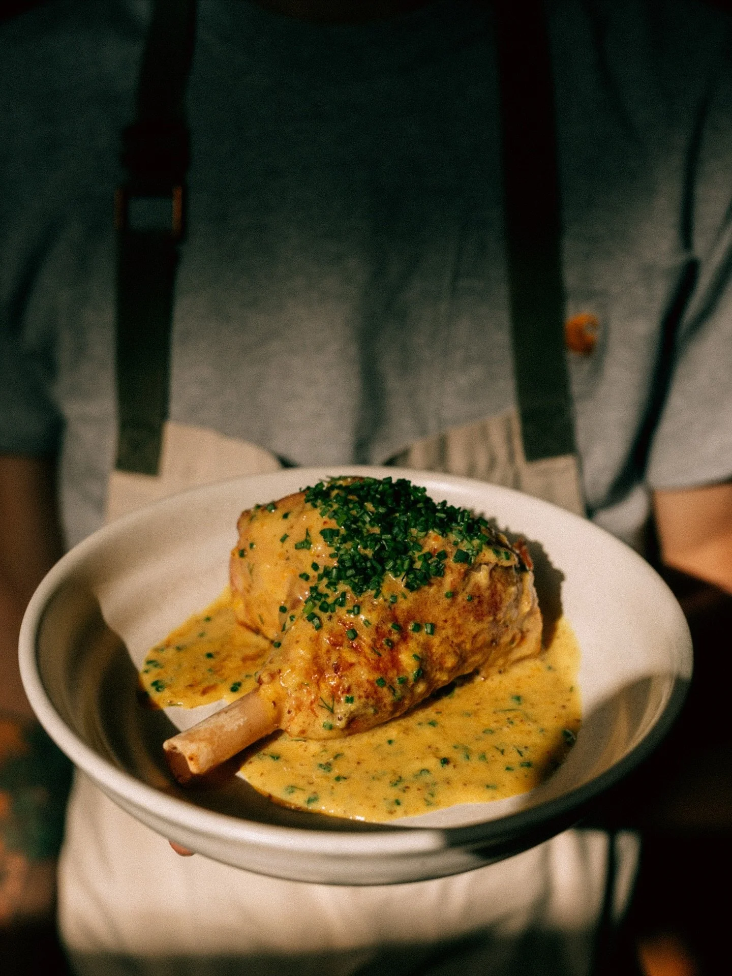 Corned Lamb
Few things are more Cleveland than corned beef and mustard. Our take on this classic Cleveland combo with lamb.
Lamb shanks, corned for five days, braised for 4 hours, pan-seared to order, &amp; blanketed in a fermented mustard sauce. Old