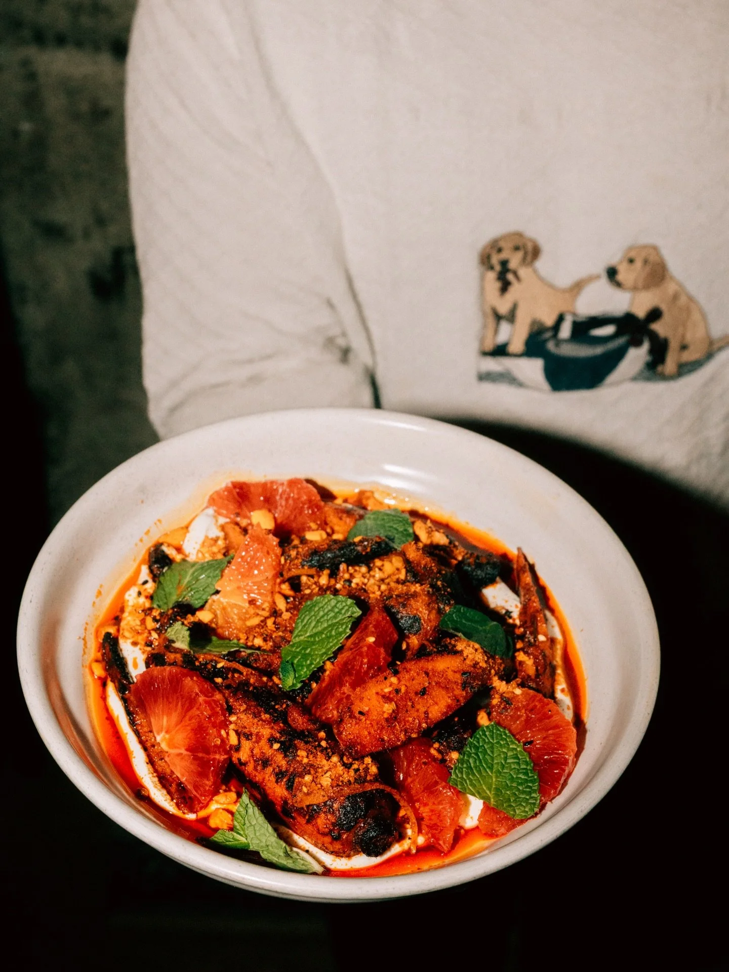 Burnt carrots
Seasoned with a cardamom spice blend,
Grilled until the exterior develops a deep char. Just enough bitterness to rein in the carrot&rsquo;s natural sweetness.
Finished in a blood orange escabeche with Spanish piment&oacute;n, marcona al