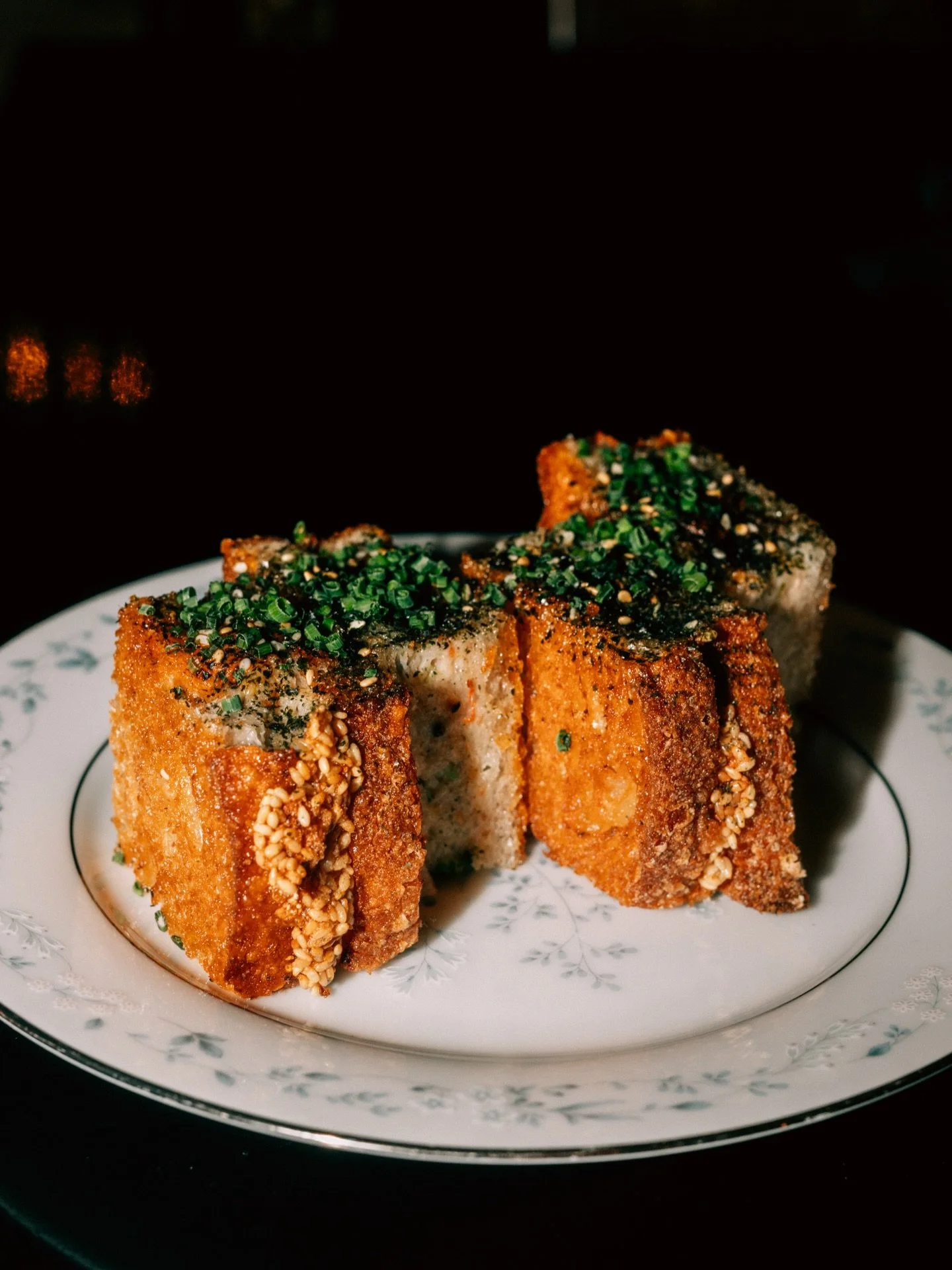 Shrimp toast 
We make a shrimp mousseline seasoned with furikake, tamari, + green onion. It&rsquo;s then spread onto sourdough from our lovely friends over at @leavenedcle 
&amp; finished with dollops of @slimjim aioli + a final dusting of furikake f