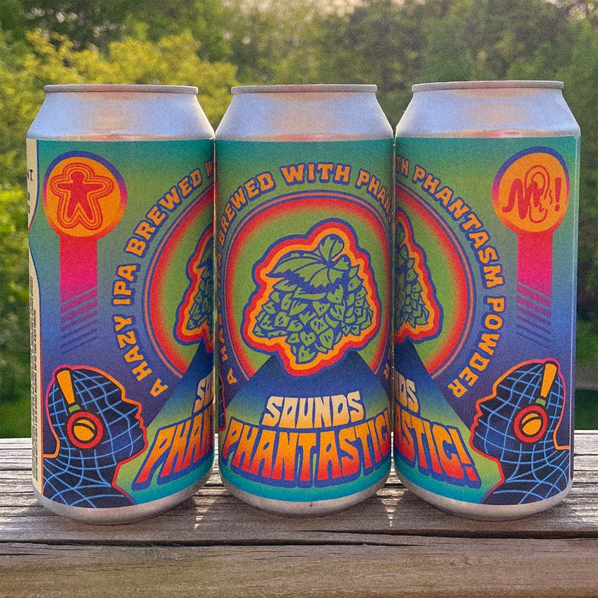 Three Radiant Beer Co. Sounds Phantastic cans with iridescent hazy IPA label illustration, Anaheim, California.