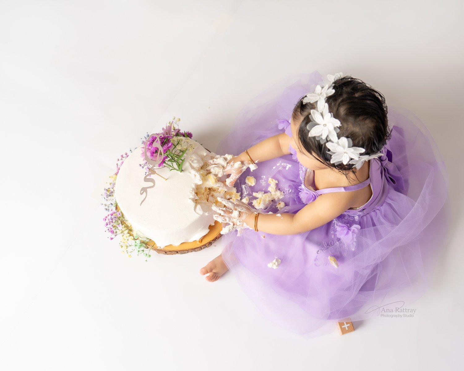 A cake smash session is a fun way to celebrate your baby's milestones. 