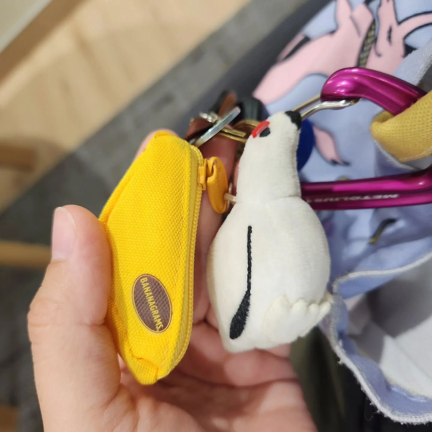 Tiny willow ptarmigan plush keychain is equivalent to the size of mini banagrams 🍌