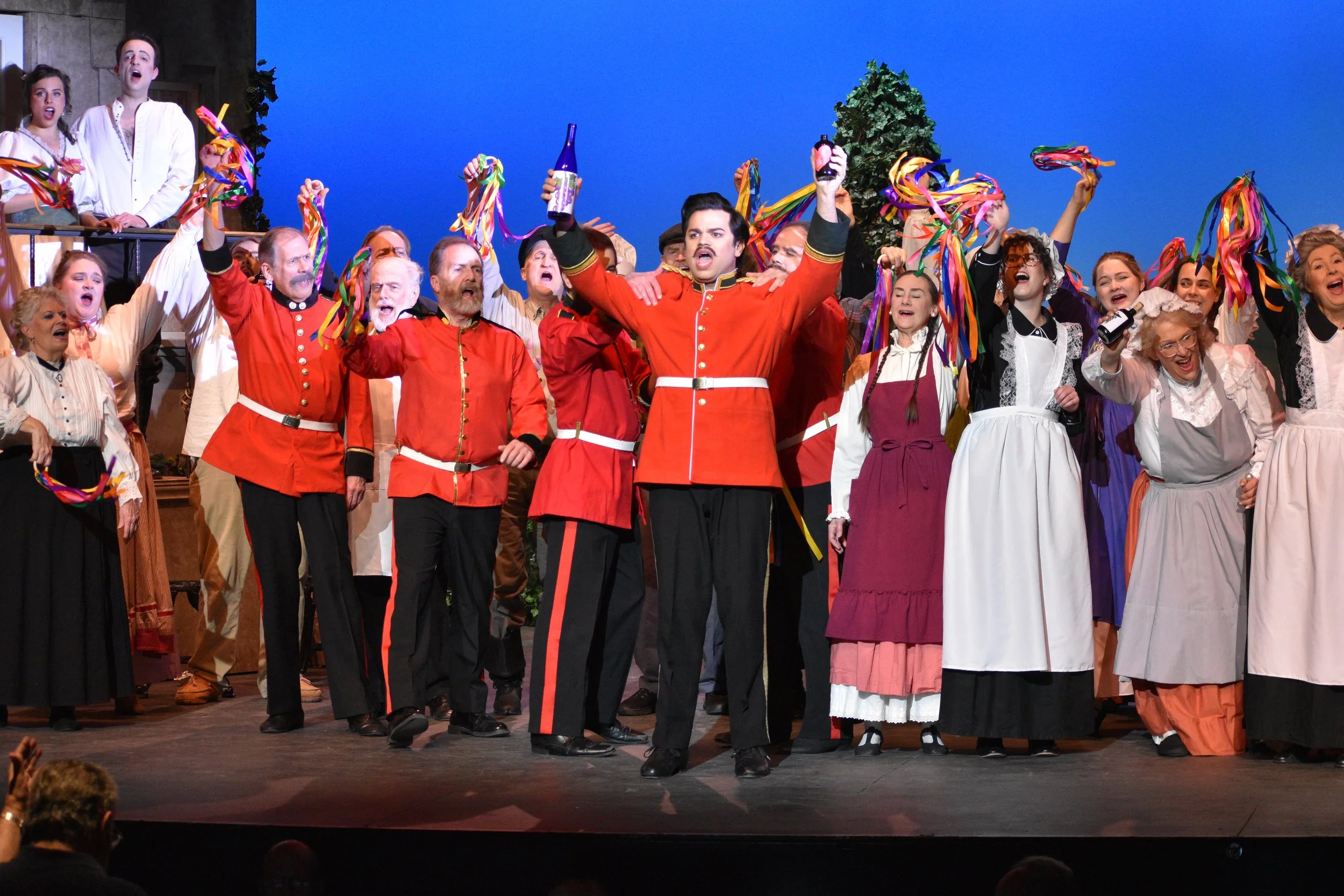 Analiese Pappas (Adina), Anthony Varner (Nemorino), Chris Fotis (Belcore) & company in VLOC's Elixir of Love (2026) - Photo by Katherine M. Rogers