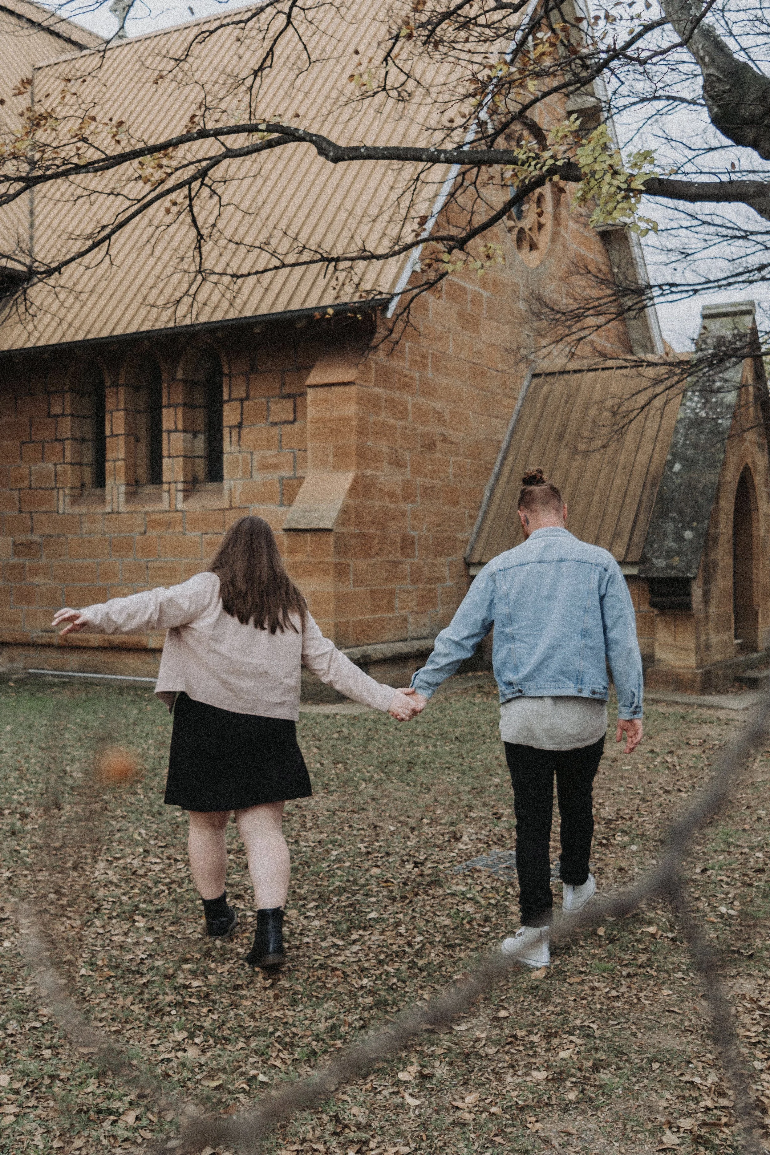 Young couple dancing through the historic town of Warwick QLD