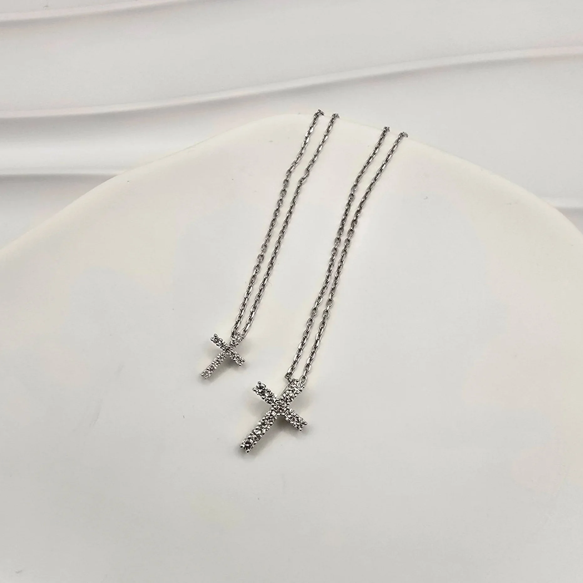 9ct white gold claw set diamond cross