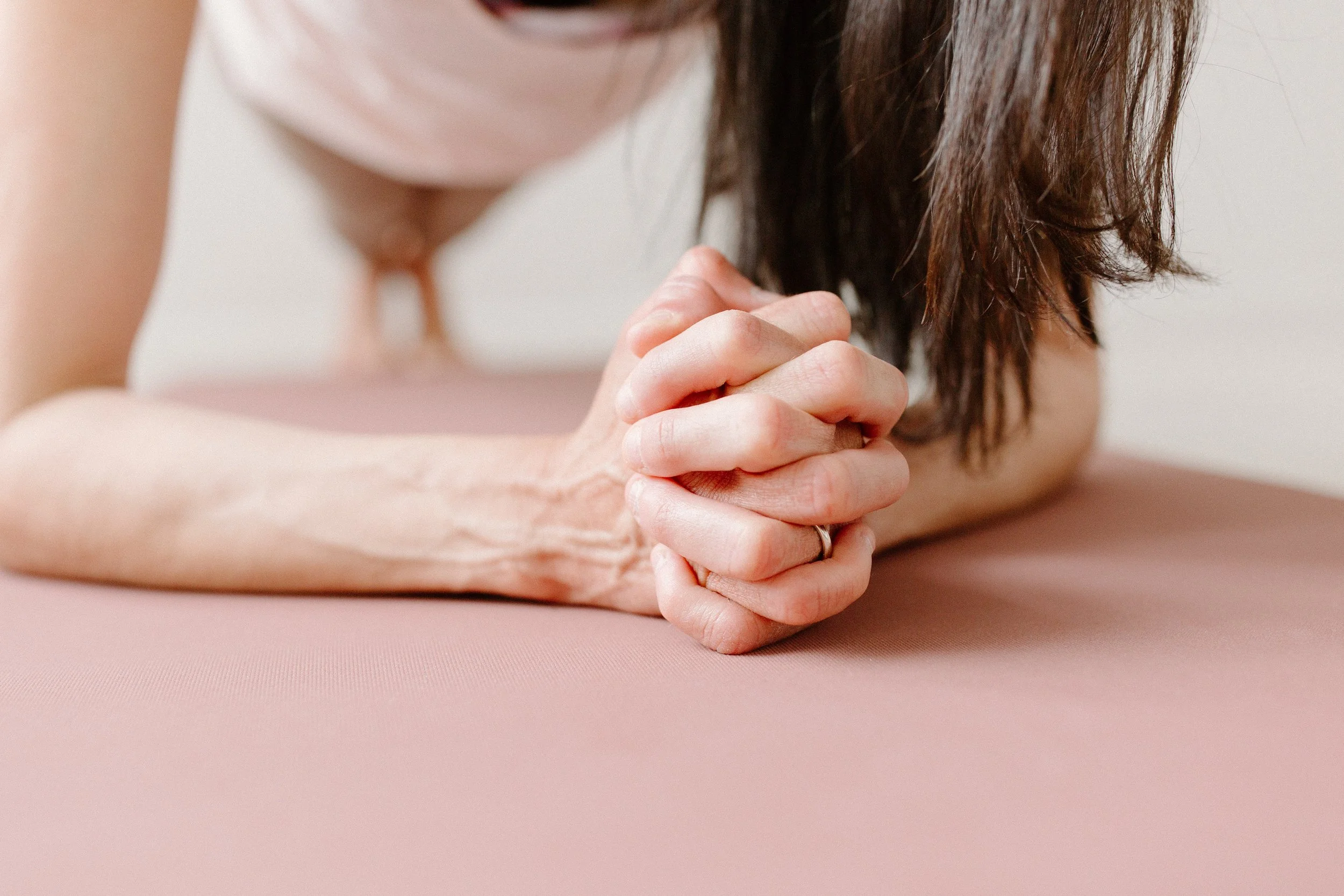 woman doing a plank on her forearms