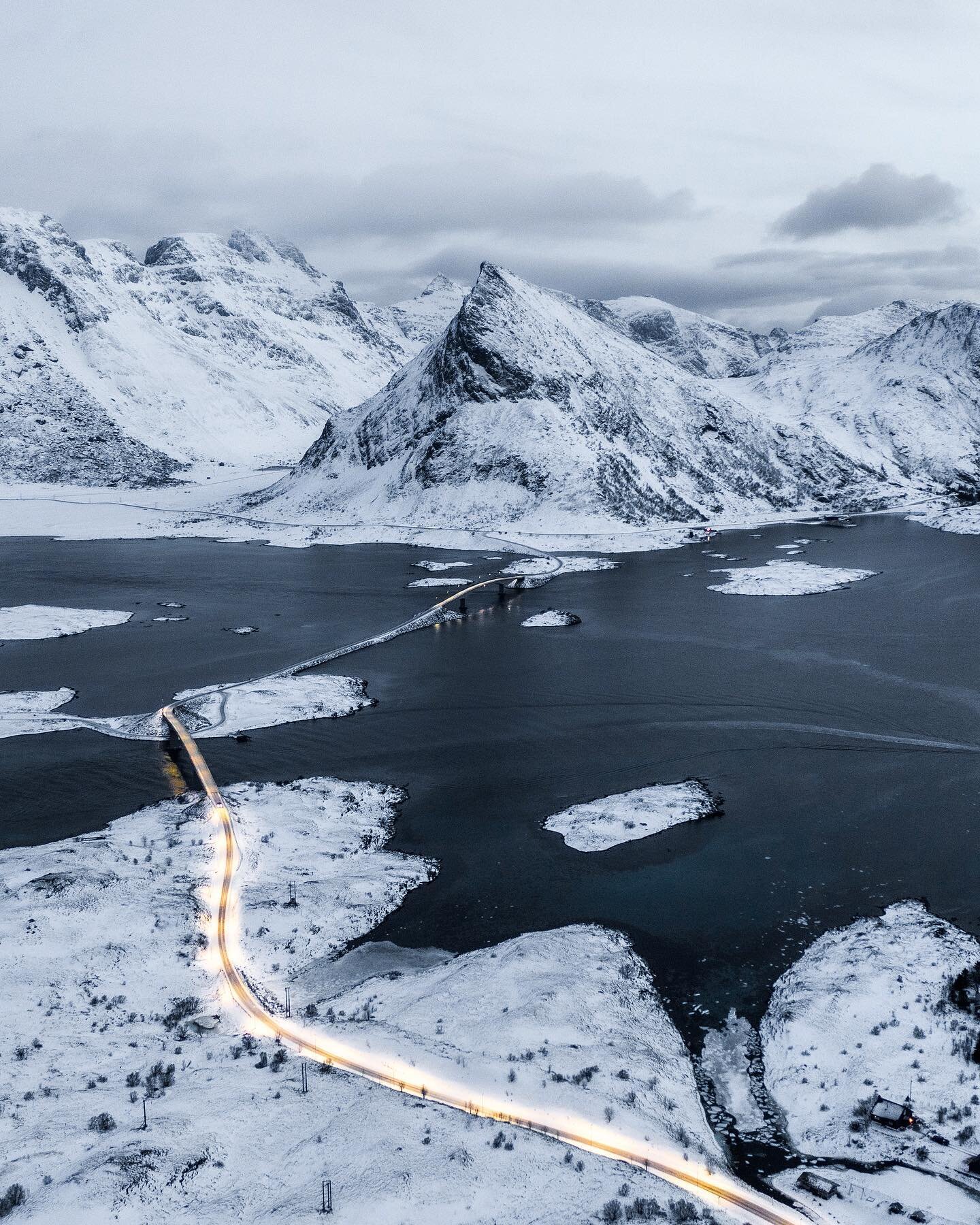 Yeaaah baby out exploring the north🥶 what did you say? Did I have to climb a mountain to get this sexy shot?  Ofc not.. My drone shot this while I stood in nothing but black boots and red briefs sippin coffee on the porch @lofotencabin ☕️ Yeah good 