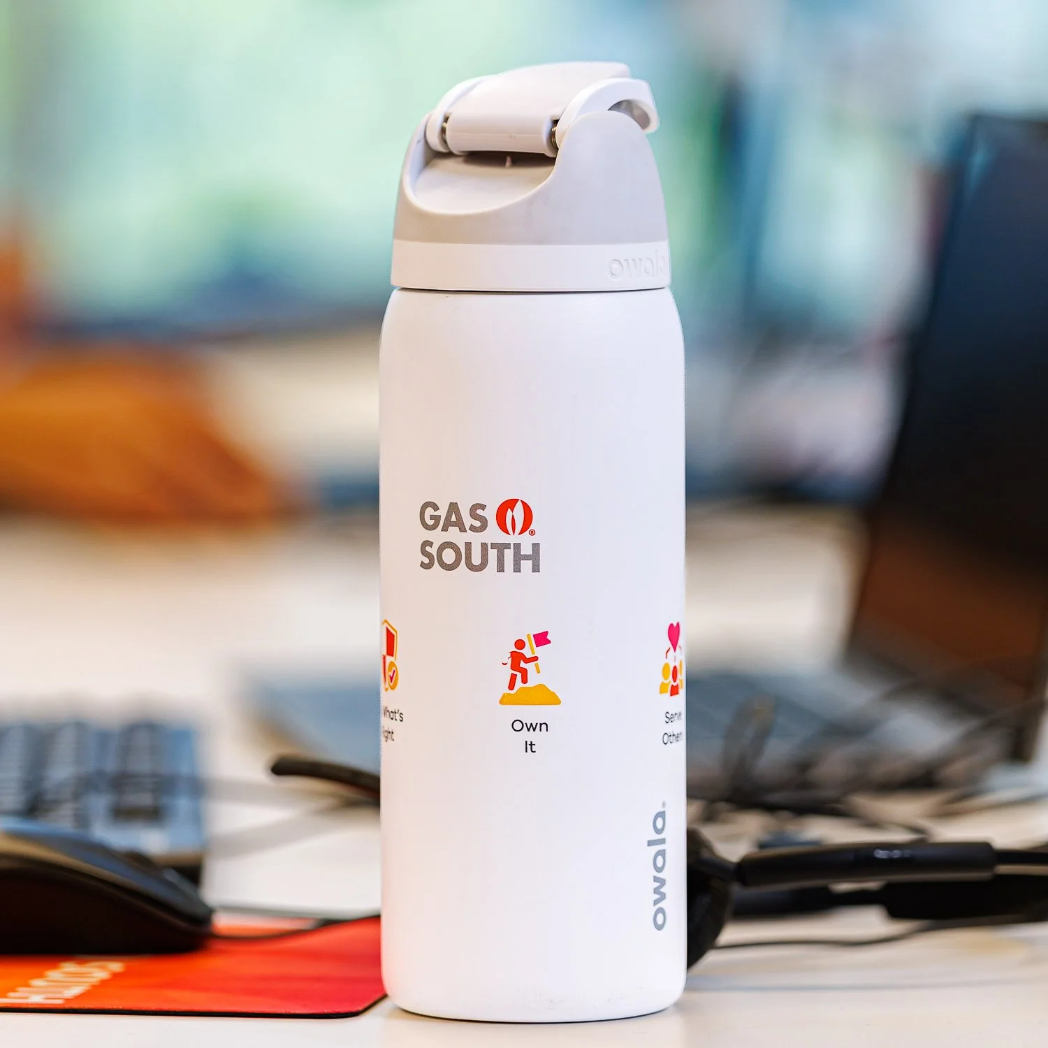 Pickleball professional athlete Parris Todd holds a Franklin Sports tour paddle and ball on a pickleball court.