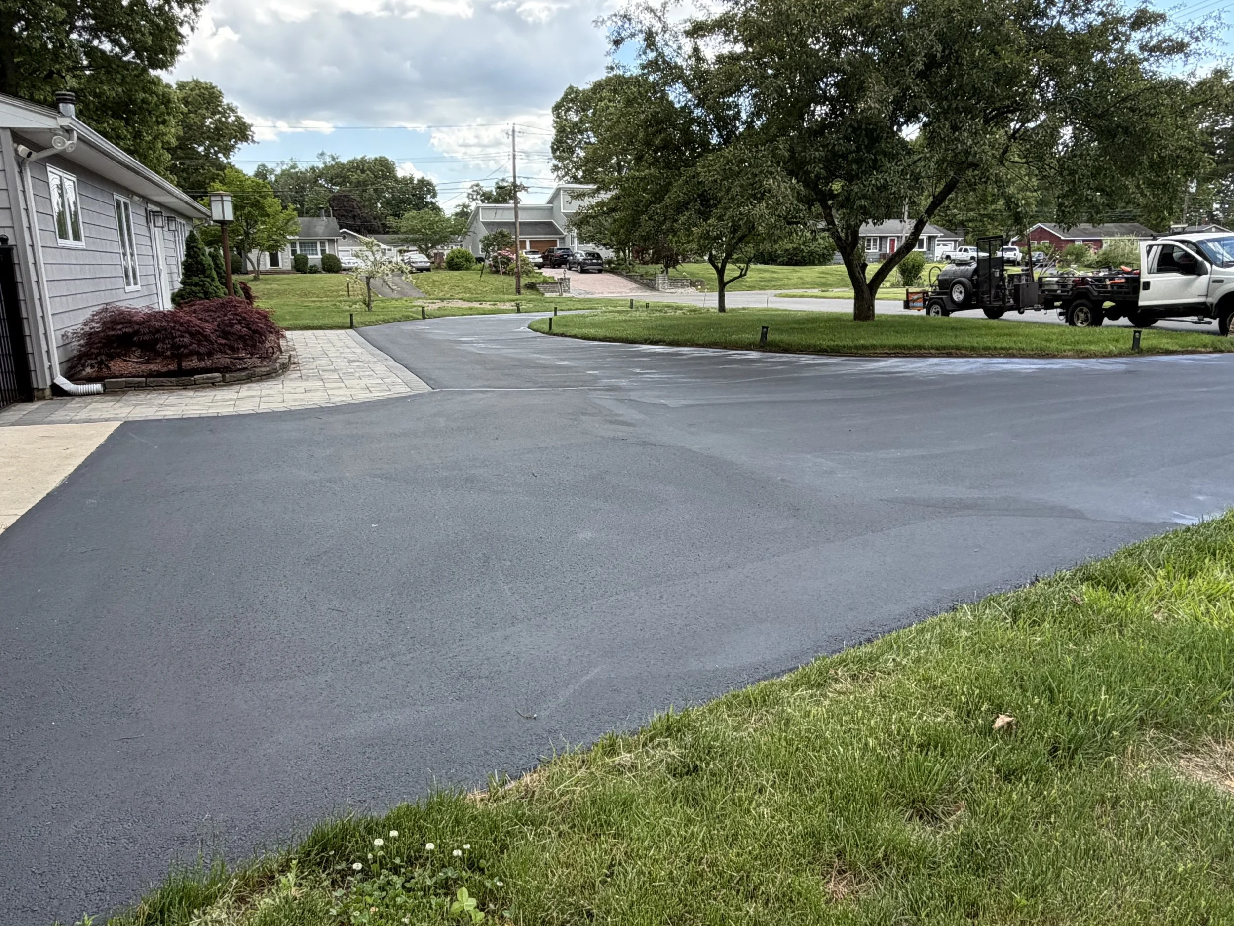 Another beautiful residential driveway transformed by the team at Five Star Complete Asphalt Services in North Haven in May 2026.