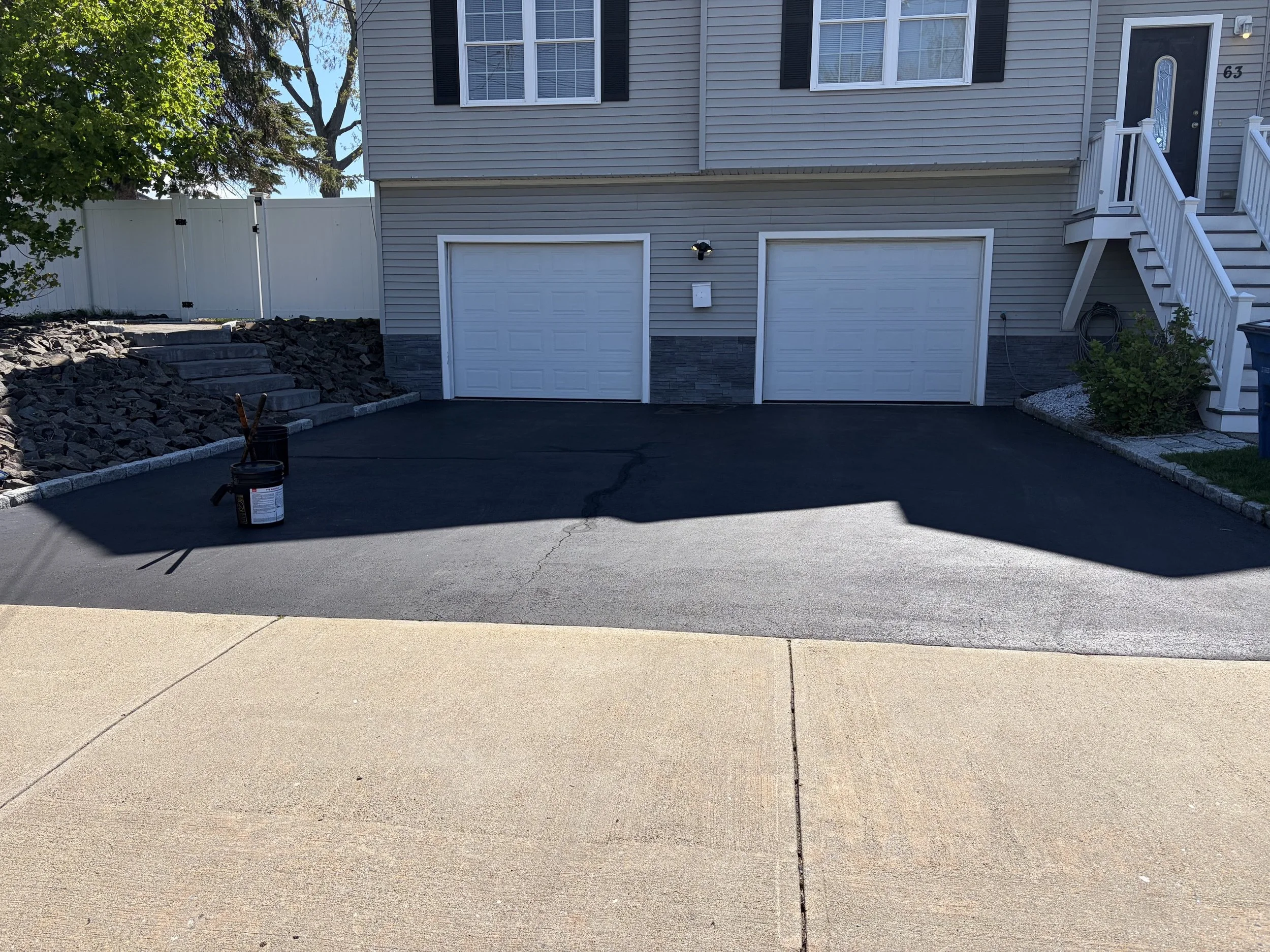Driveway sealcoating in West Haven, Connecticut done May 8, 2026