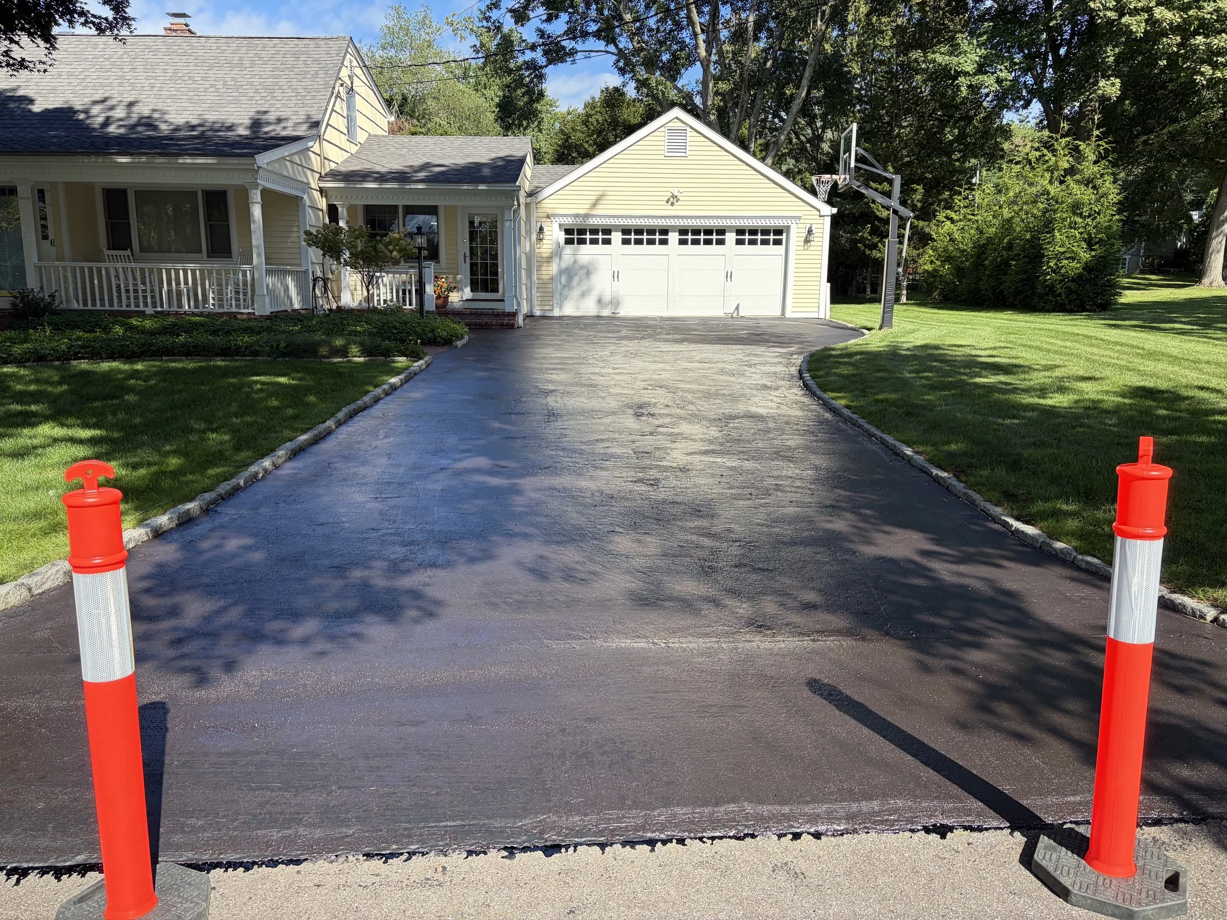 Another driveway refreshed and protected in Southport, CT.

Five Star Complete Asphalt Services gave this residential driveway a fresh sealcoat to help protect the asphalt from weather, moisture, and everyday wear while restoring that clean, dark fin