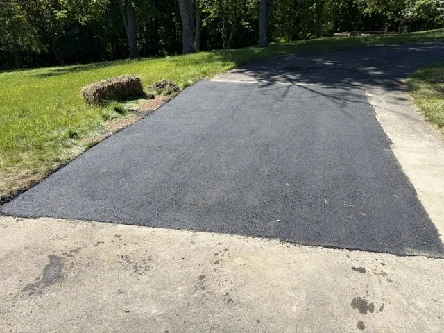 Completed asphalt paving patch repair done in Cheshire, CT