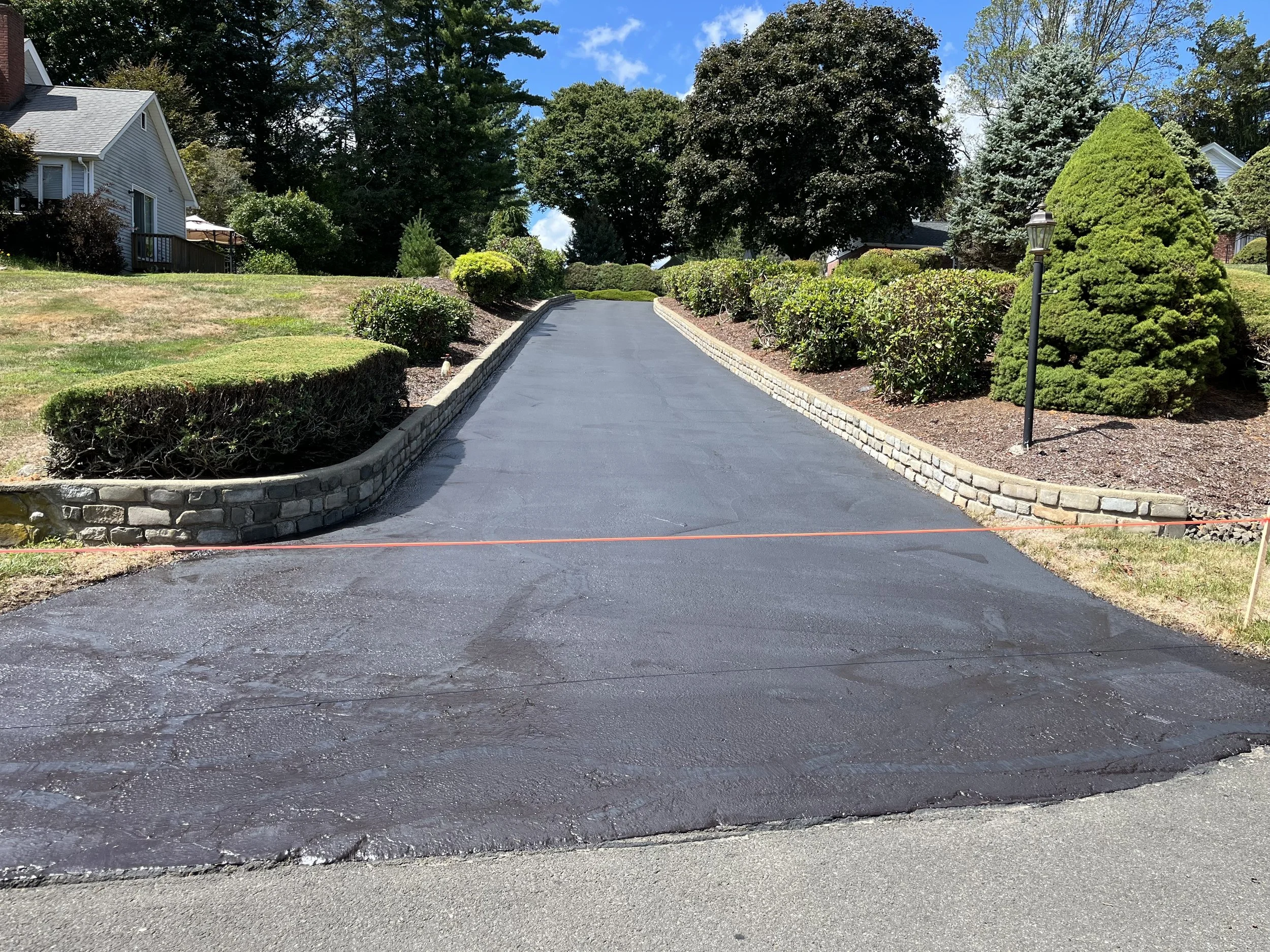 Orange sealcoating done Aug. 27, 2025