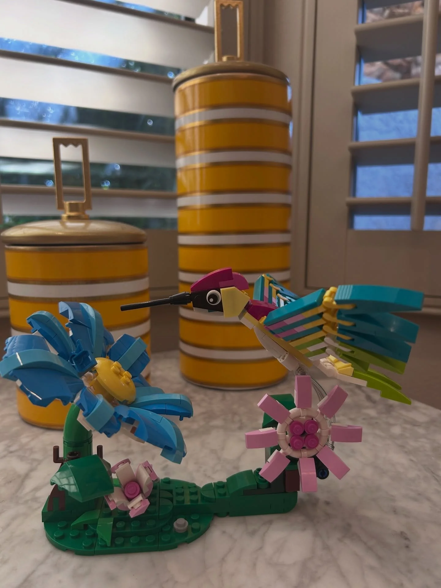This morning, I came home from tennis 🎾 to find a small, unexpected gift on my doorstep a  @lego set, thoughtfully left by my neighbor.

She knows I&rsquo;m drawn to hummingbirds. She&rsquo;s heard me share the story that before my mother passed, sh