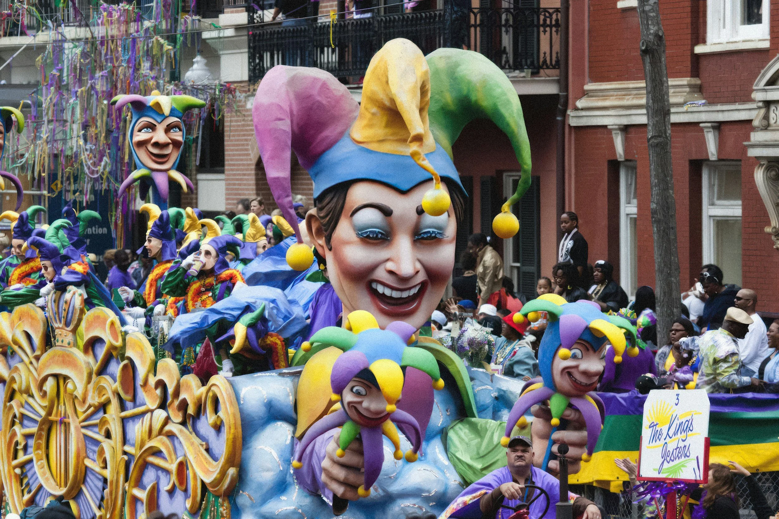 Mardi Gras float with Happy Court Jester smiling