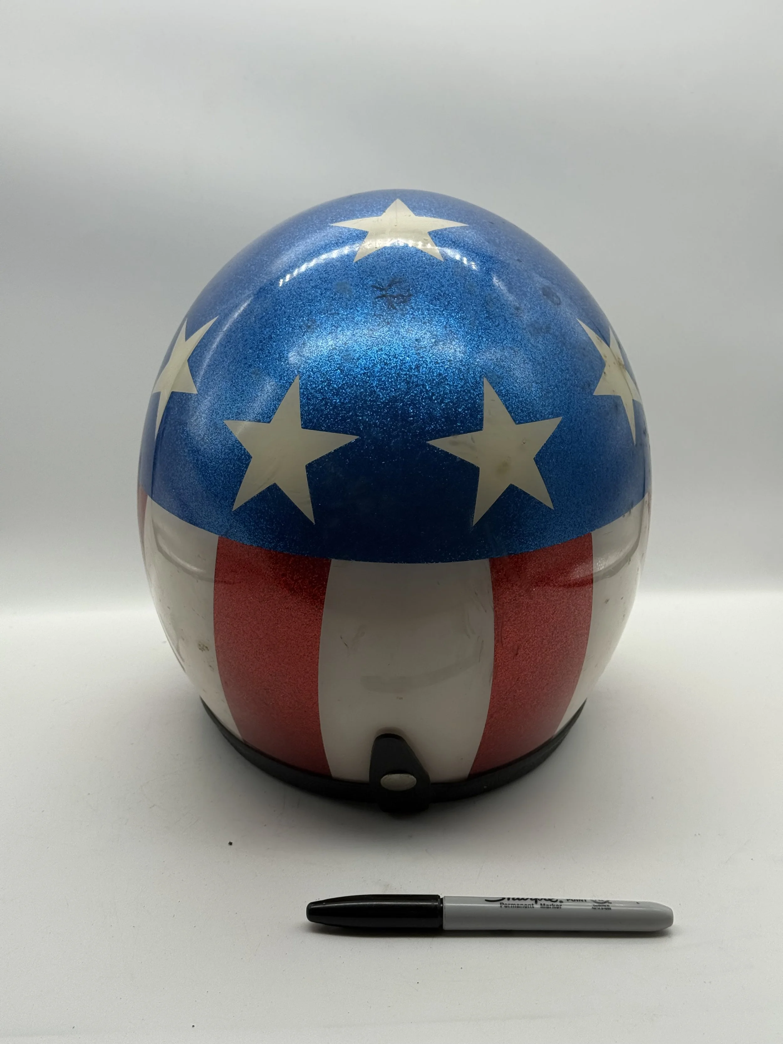 Back of the Captain America helmet showing the red and white stripes