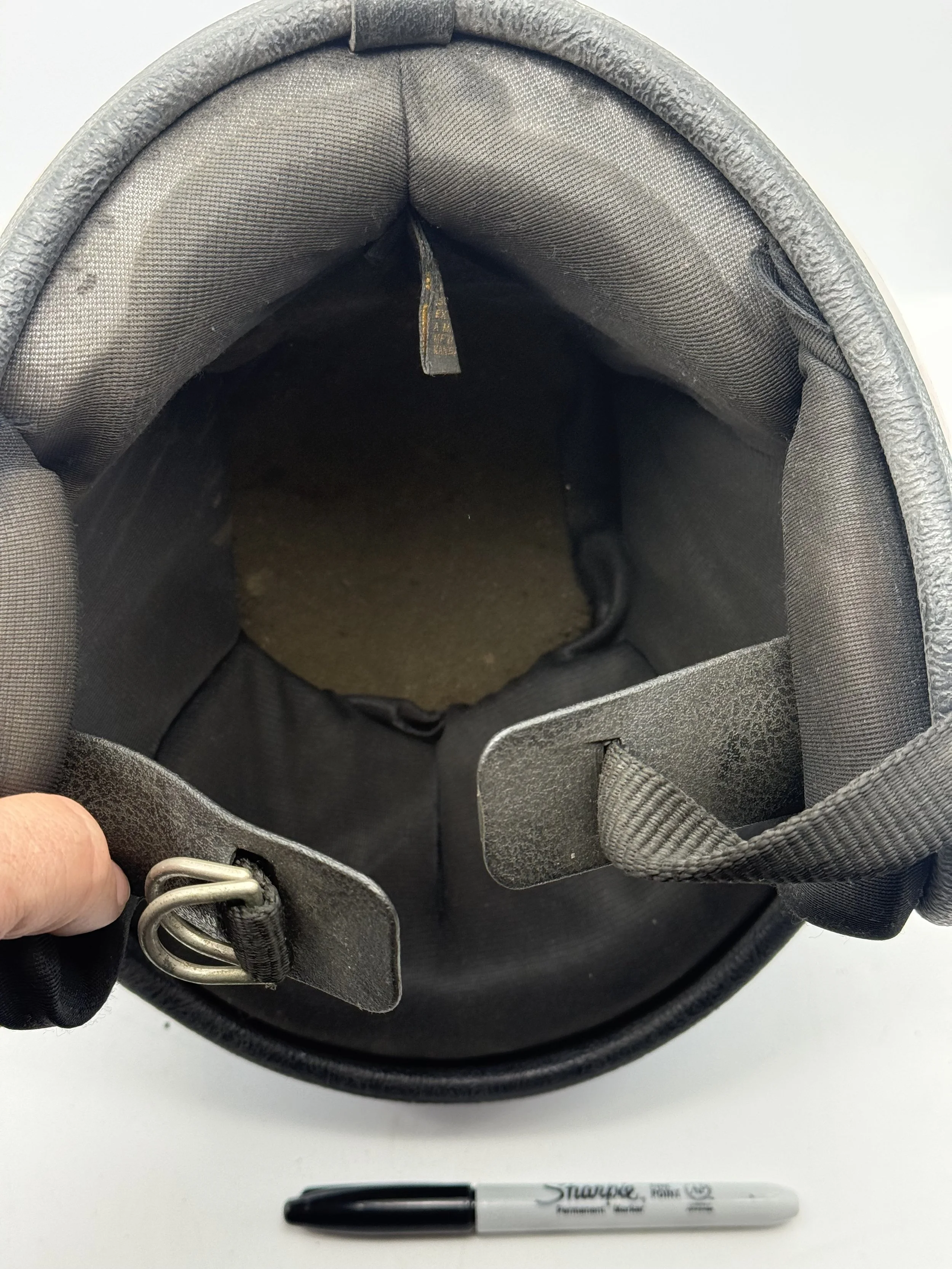 Helmet liner and padding, marker for scale