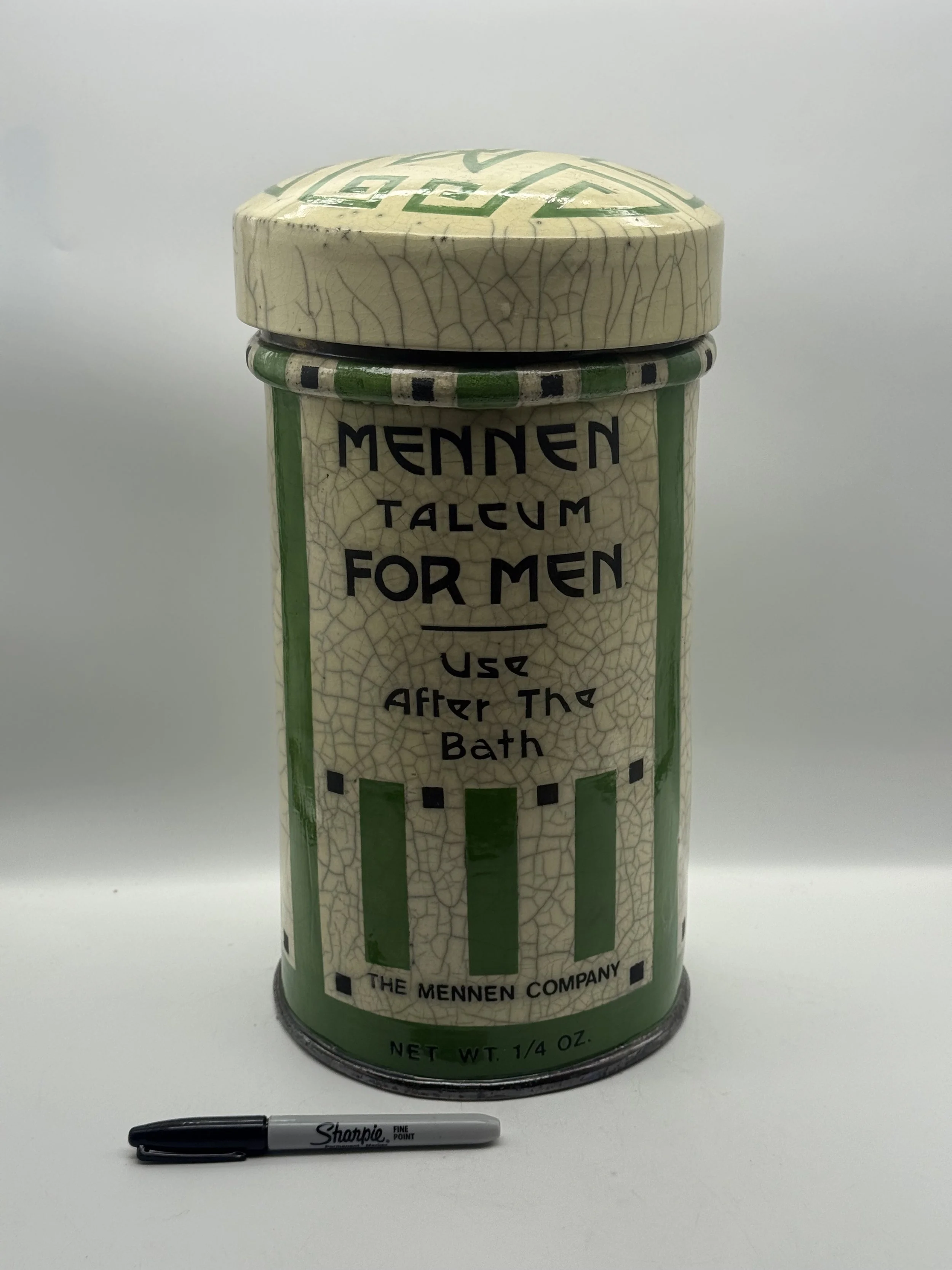 Karen Shapiro raku Mennen Talcum for Men with the lid on, marker for scale