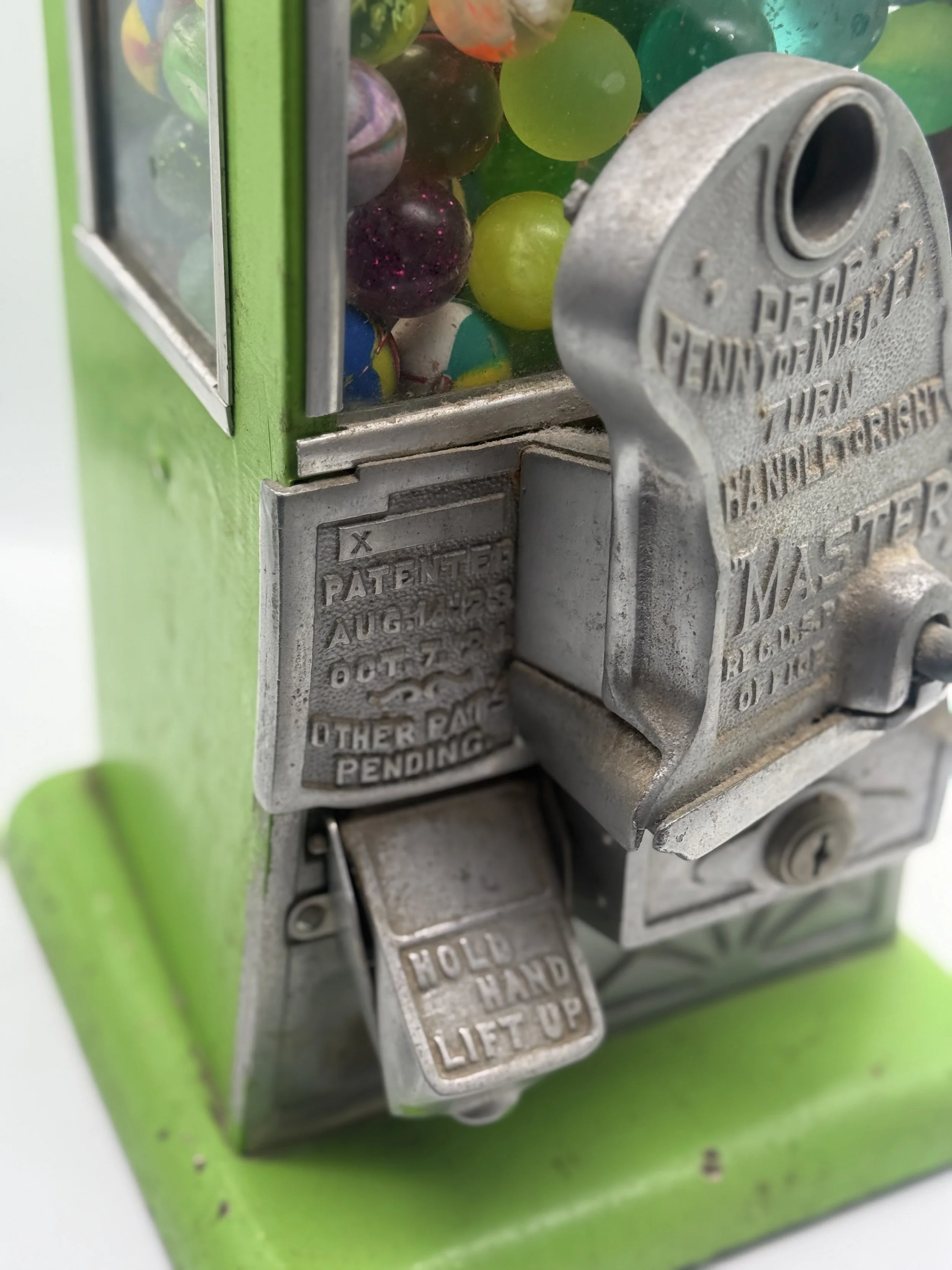 Master gumball machine coin mechanism, angled view
