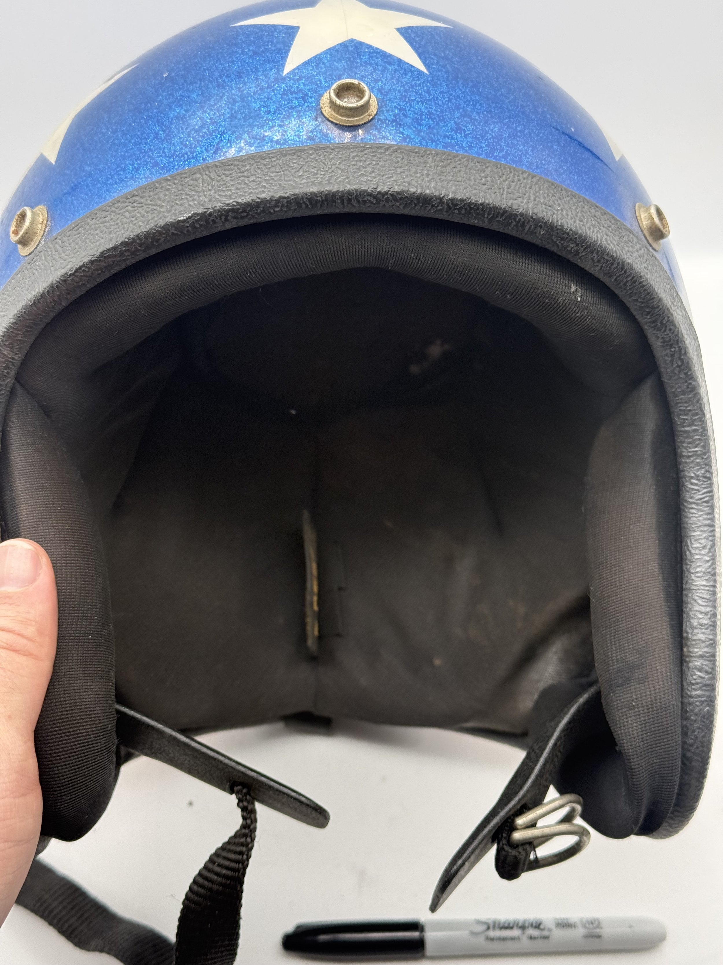 Inside of the helmet showing the chin strap