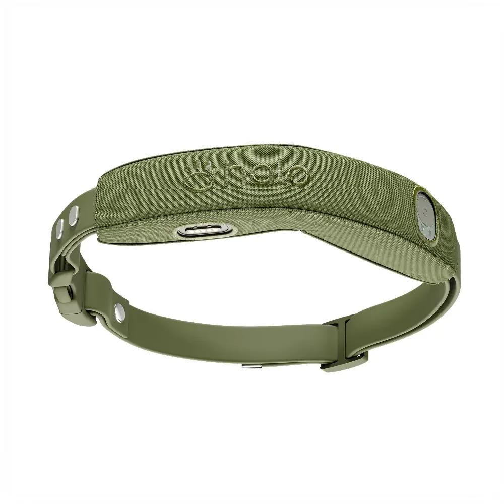 Olive green wearable device with a fabric strap, buttons, and an embedded control panel.