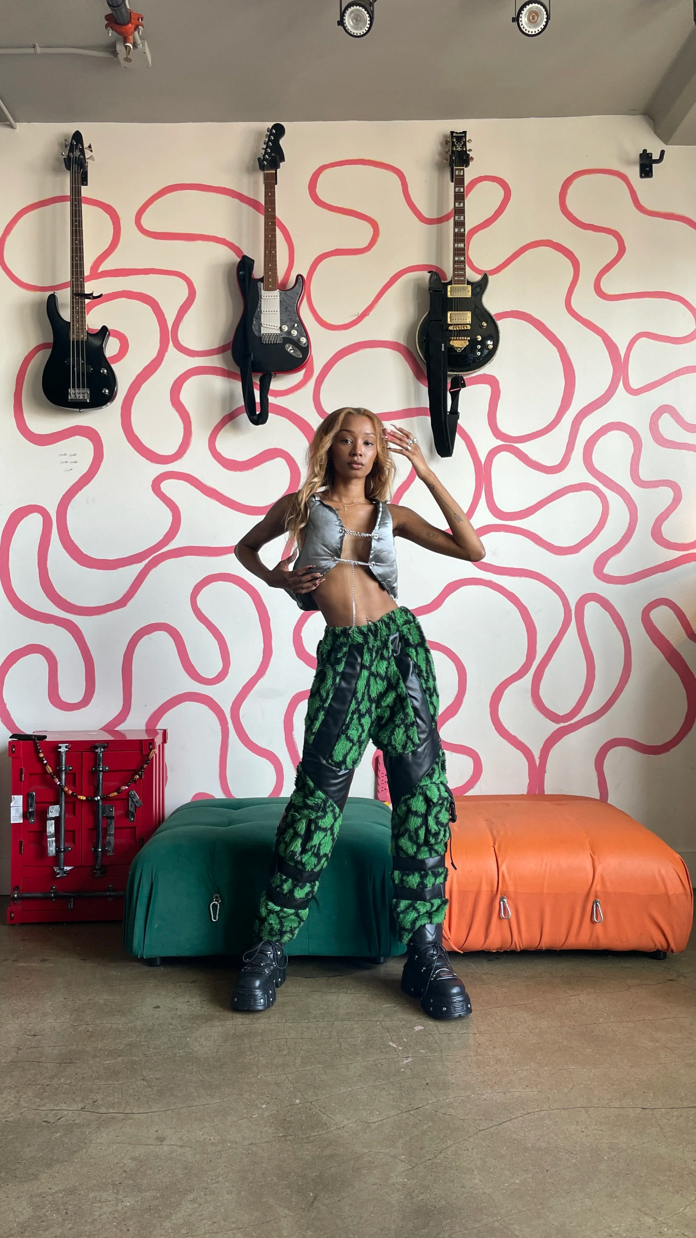 The Sculpted Spine Vest   
The Cyber Fur Pants in Green 
- Size 30