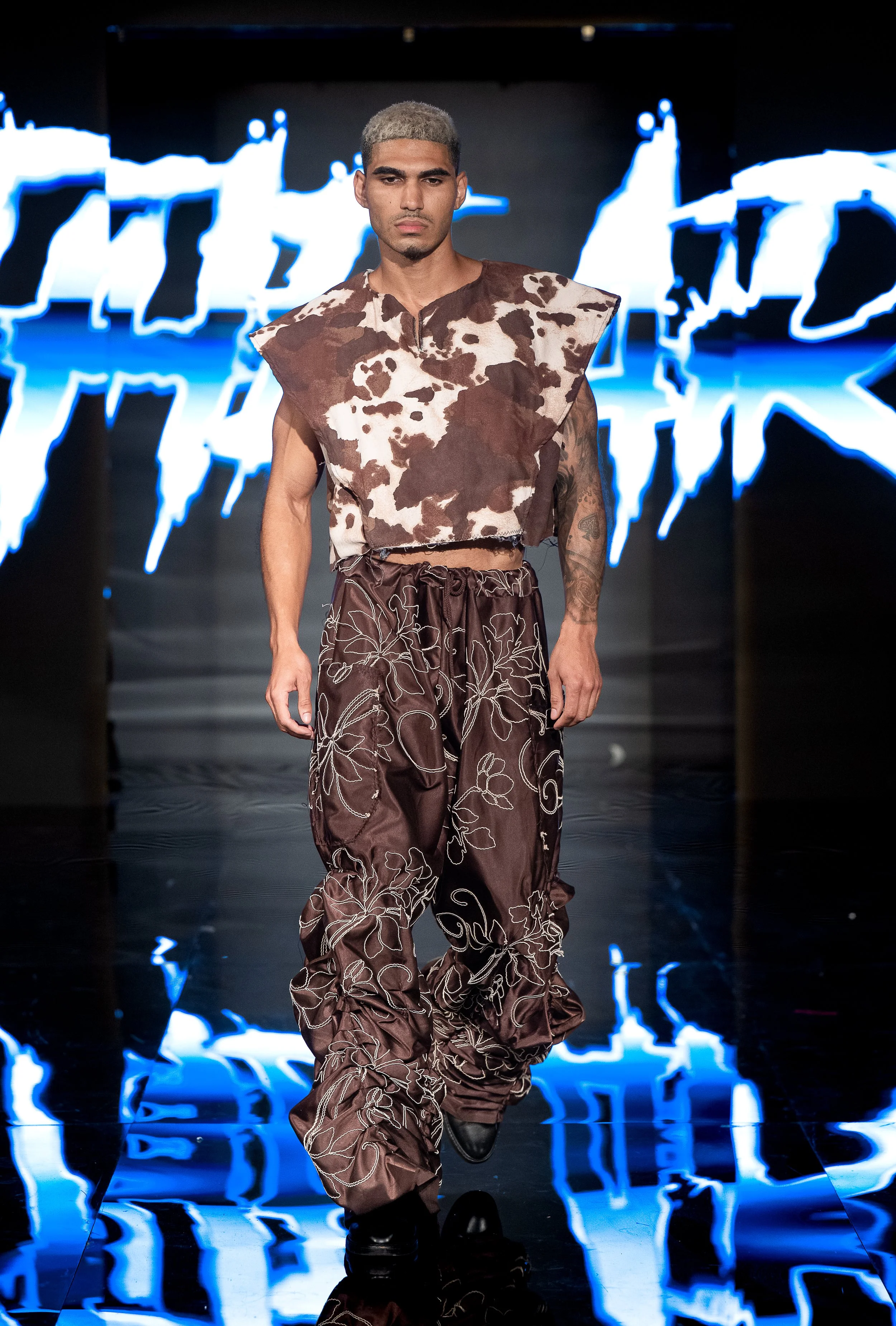 NEW YORK, NEW YORK - SEPTEMBER 10: A model walks the runway at the LRE' The Artist show during New York Fashion Week Powered By Art Hearts Fashion at The Angel Orensanz Foundation on September 10, 2026 in New York City. (Photo by Mark Gunter/Getty Im