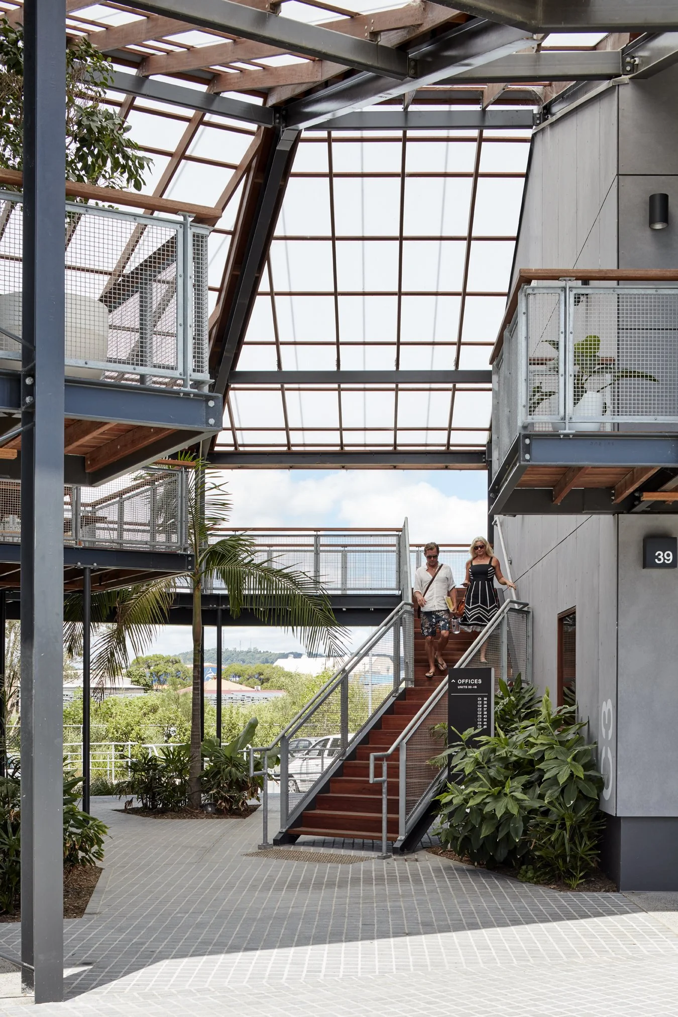 professionals walking sown flight of stairs at Habitat Byron Bay