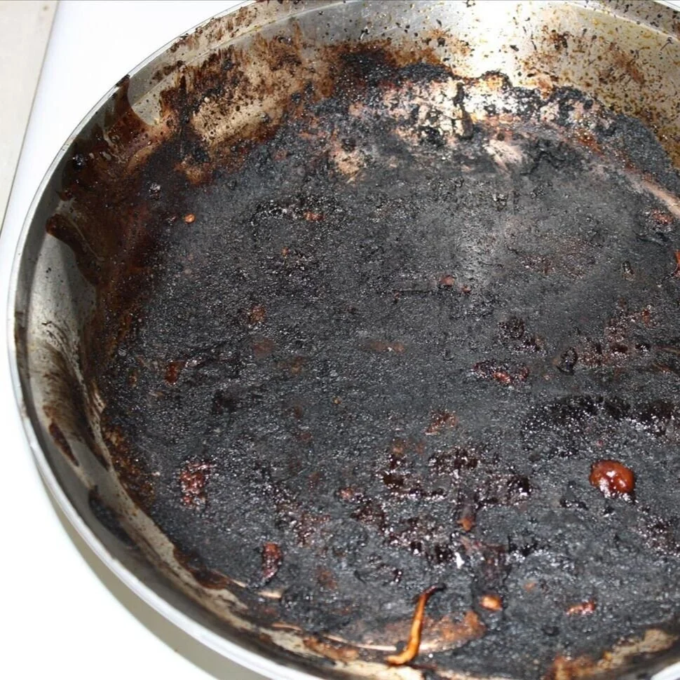 Cleaning a burnt pot