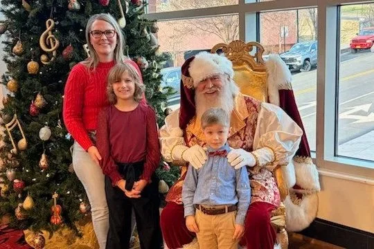 SANTA AND HIS ELF HAVE BREAKFAST WITH LPD CHILDREN