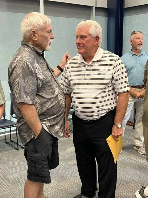 Two Men and Folder.jpeg