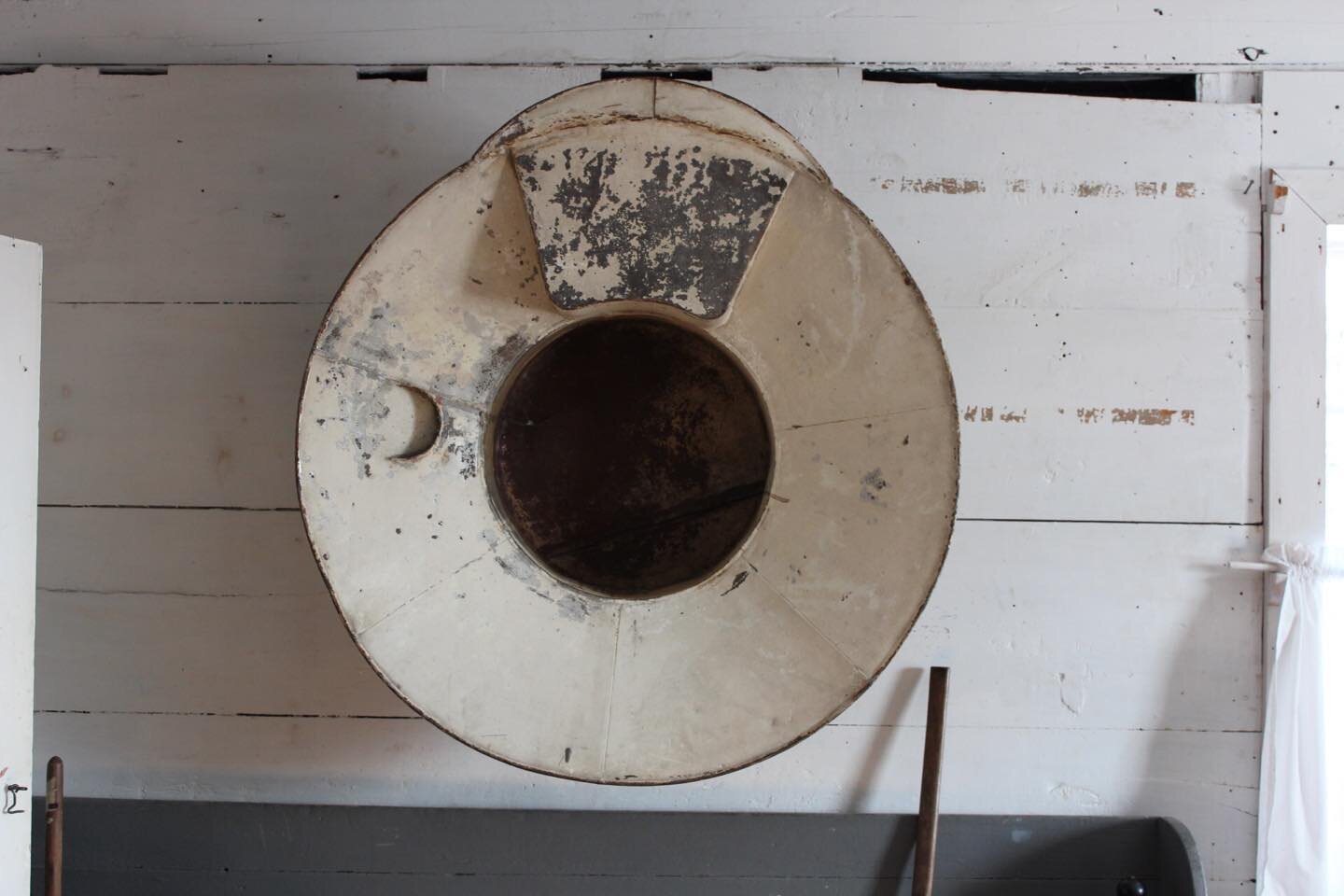 Our Team enjoys learning from our Clients. While at Cole Harbour Heritage Farm Museum taking photos we were introduced to this washbasin where you sit on the flat part and pour water over yourself and there is a little spot for your soap on the side.