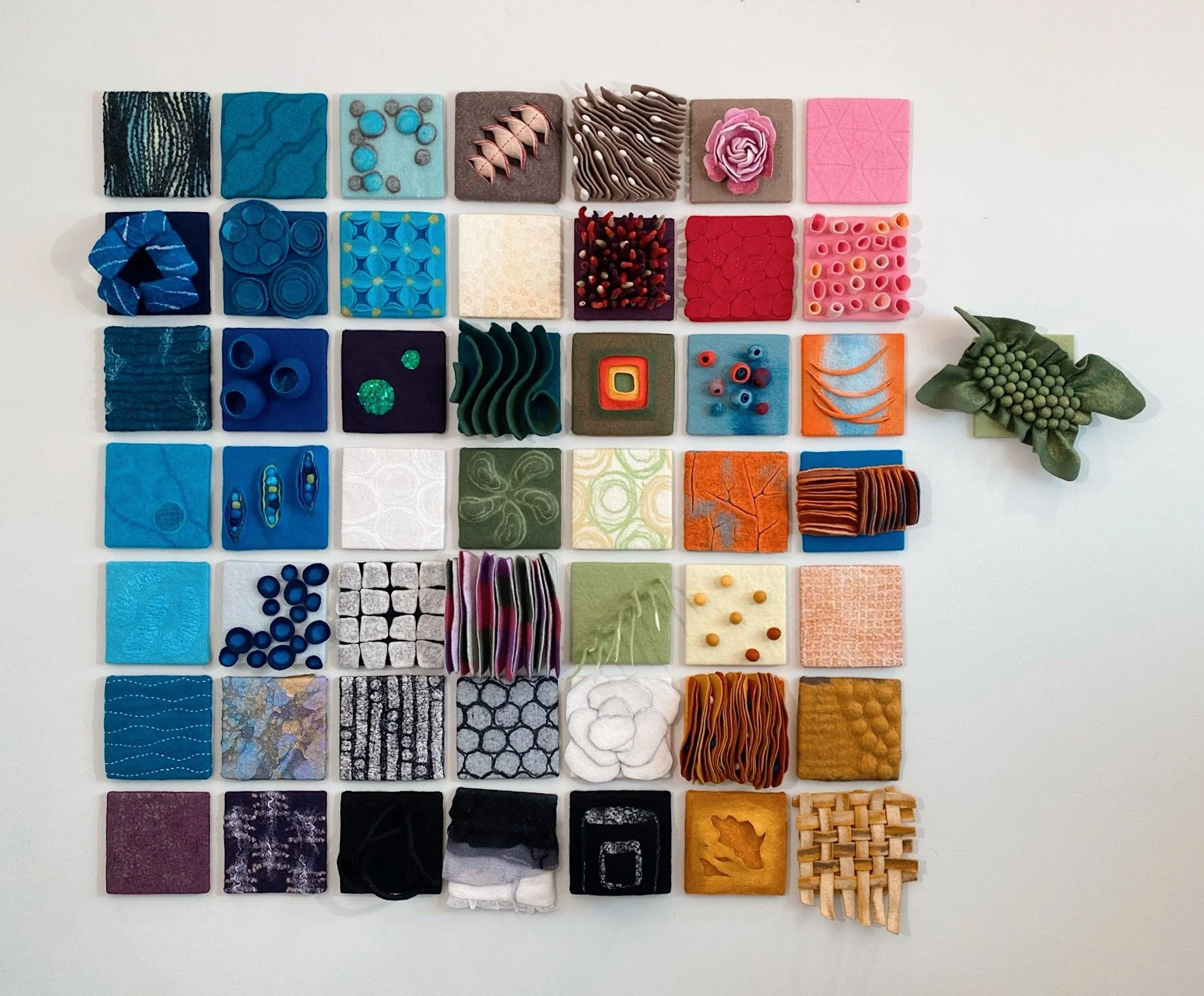 50|50, 2021. Merino wool with assorted mulberry papers, plant fibers and silk; wet felted.
